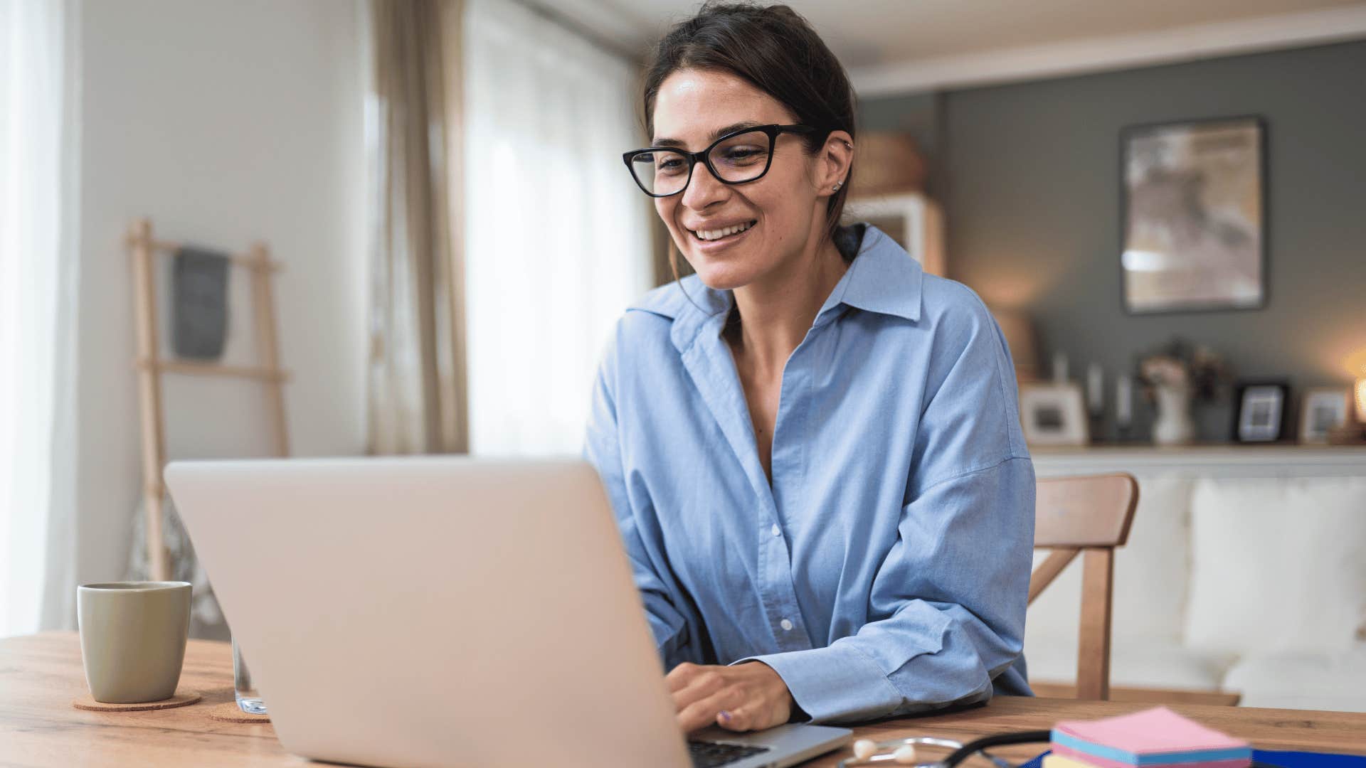 woman typing on laptop