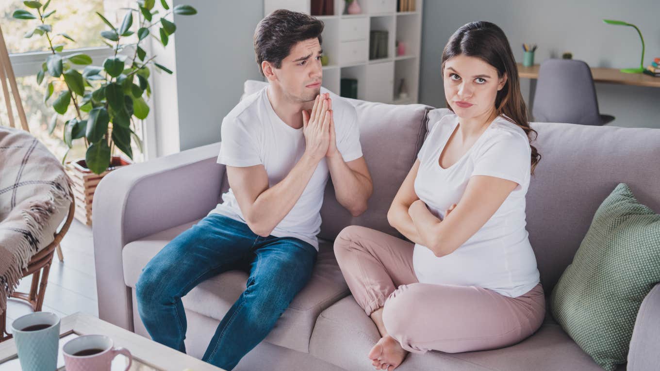 husband and pregnant wife having a disagreement