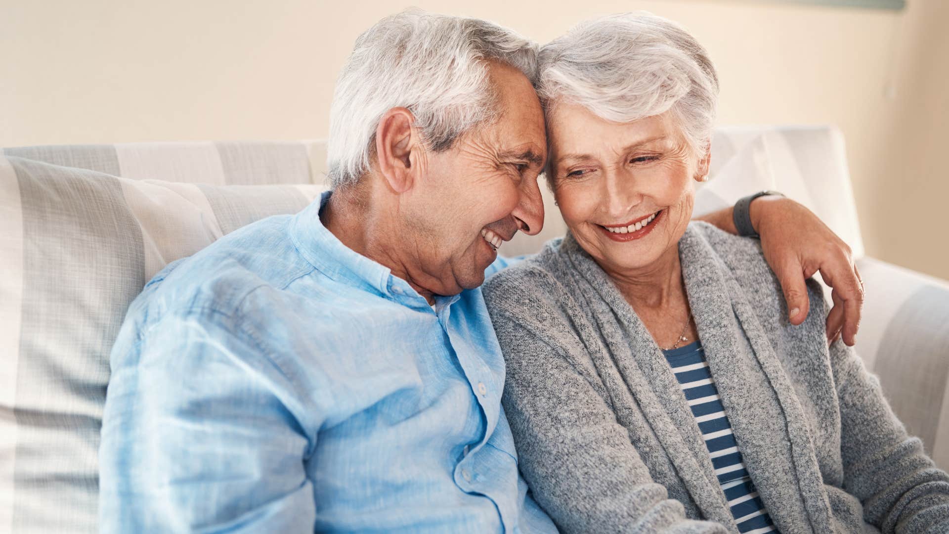 older couple hugging each other