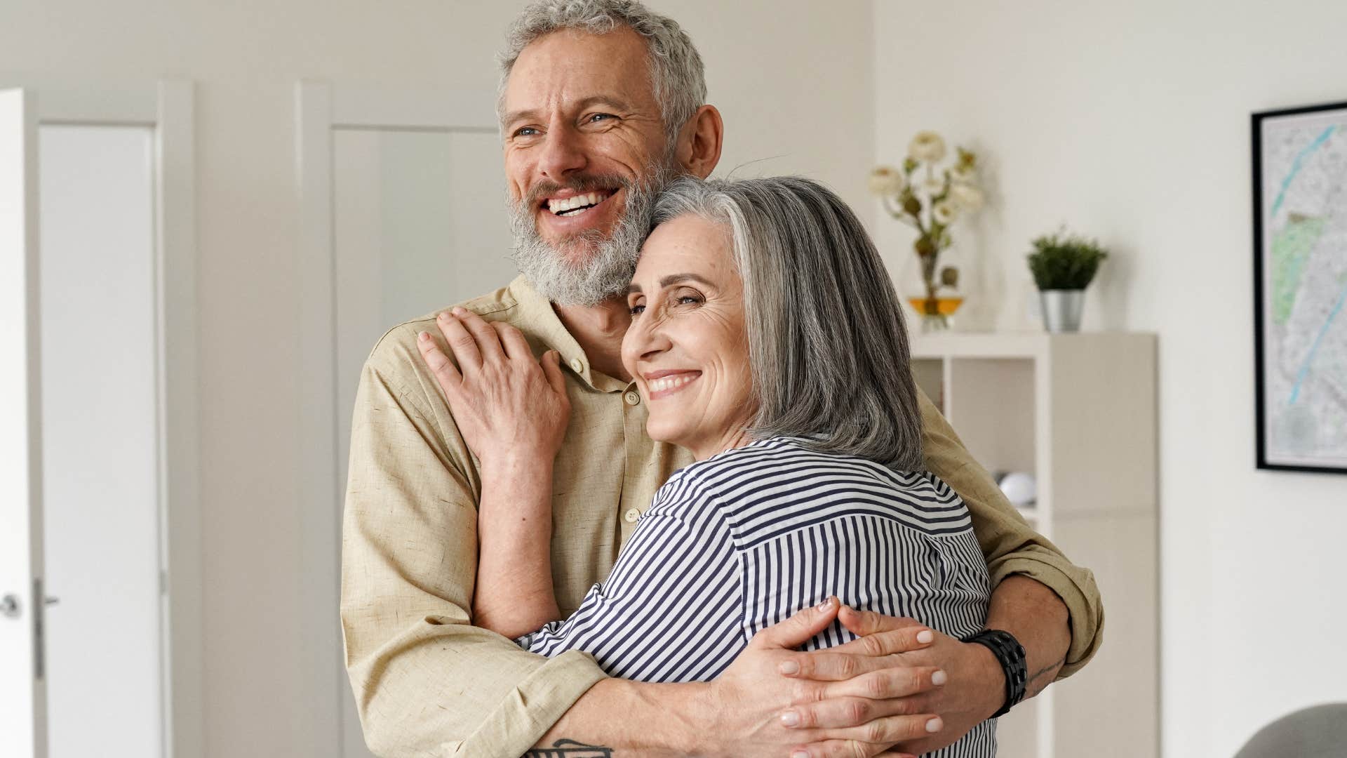 smiling woman celebrating her husband's wins