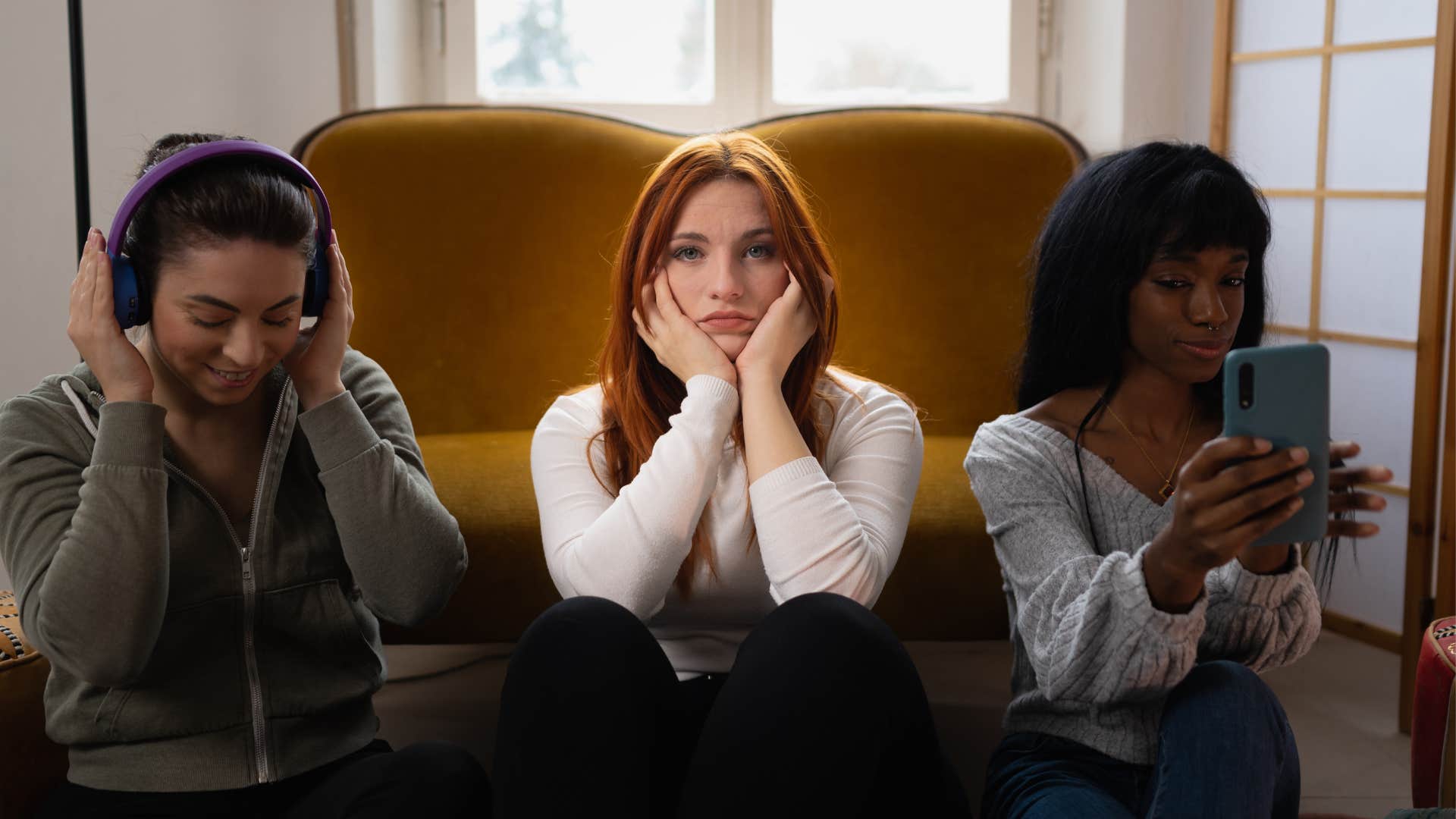 Three women, busy, neglected