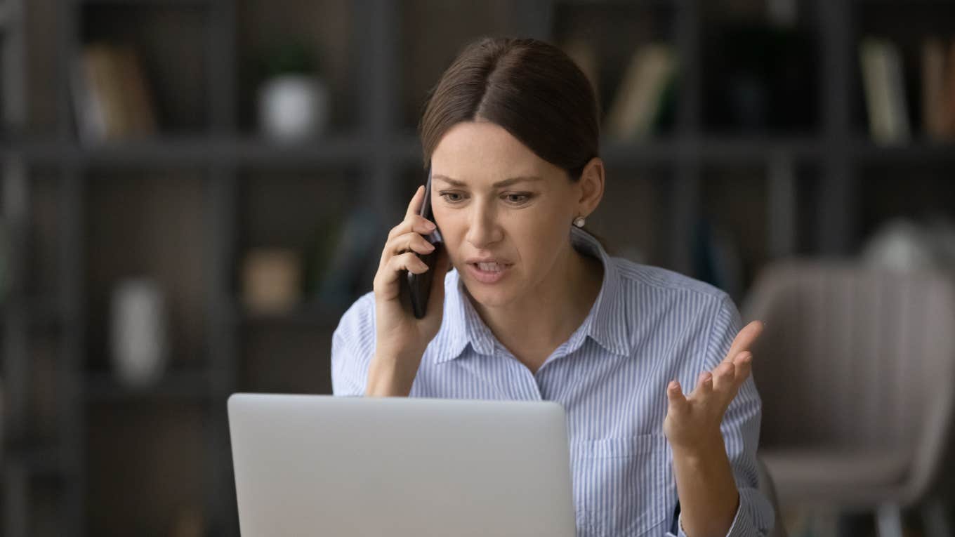 Woman on the phone with recruiter feeling confused