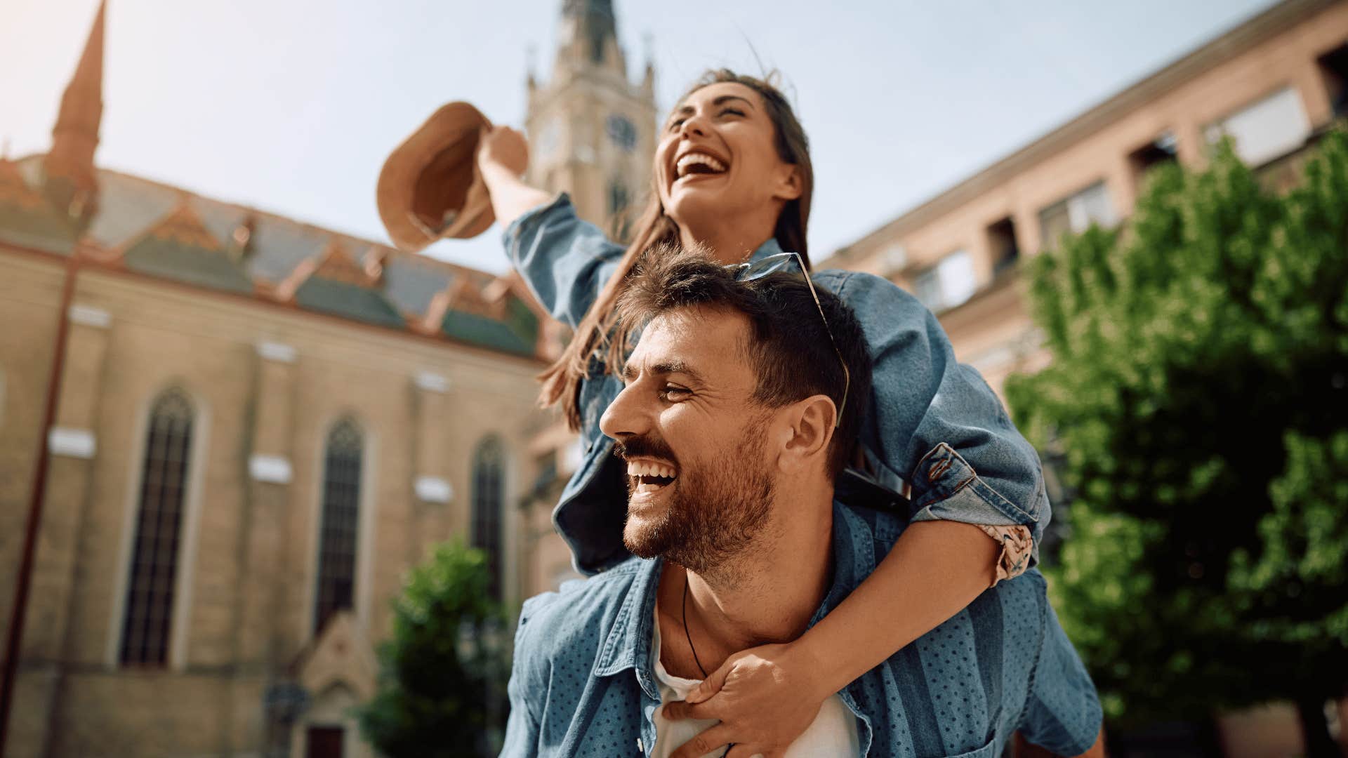 woman on man's back