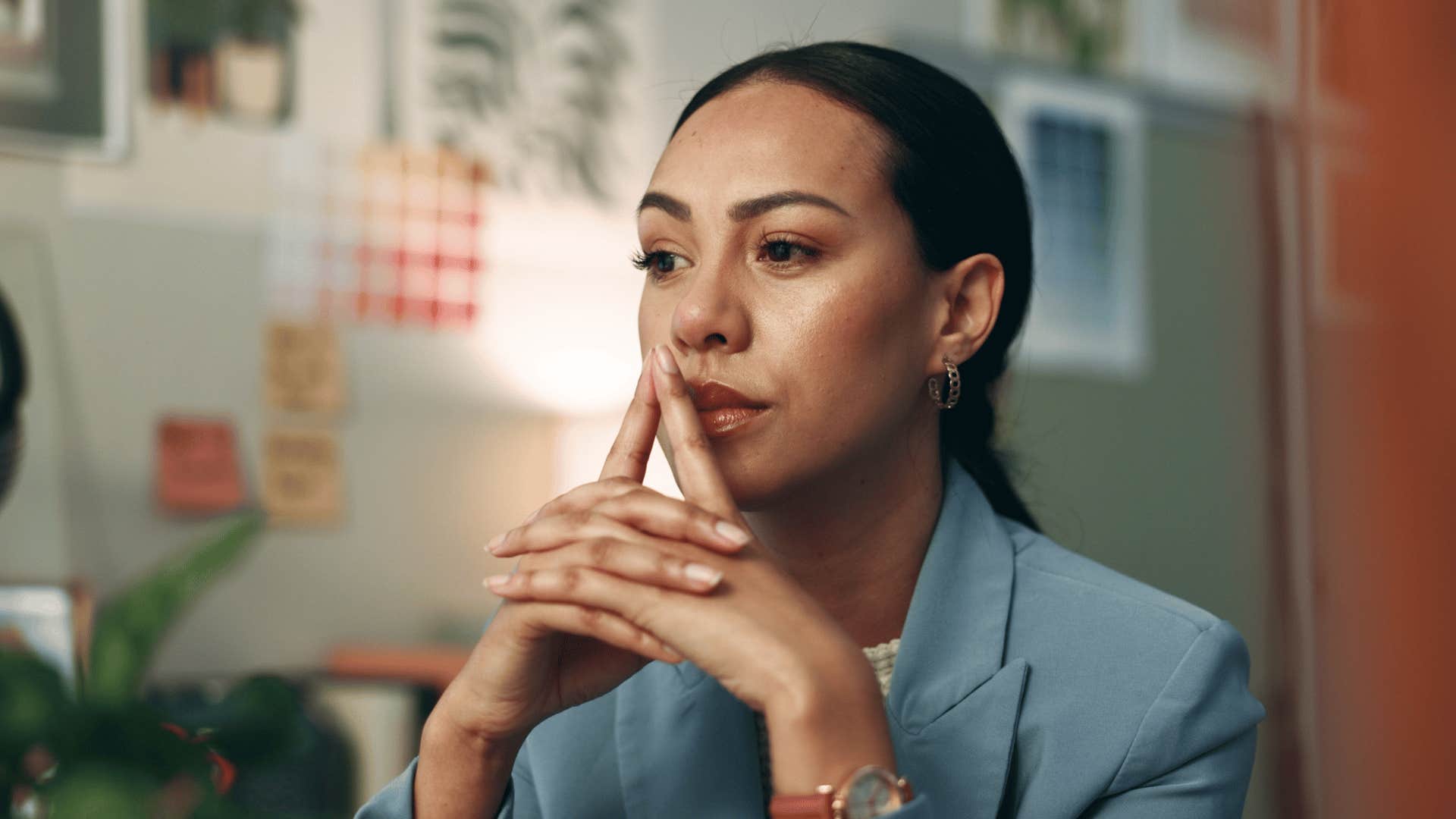 woman thinking in office