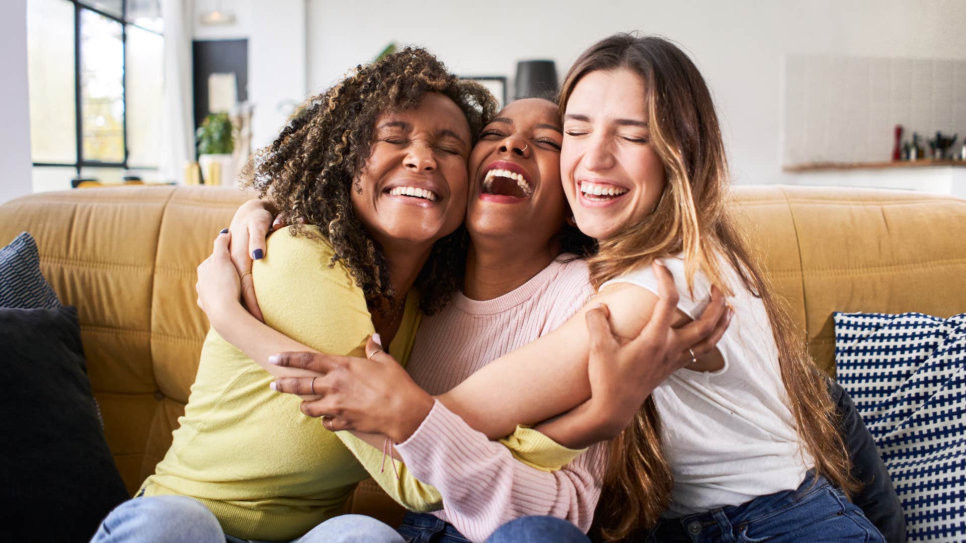 friends hugging and happy