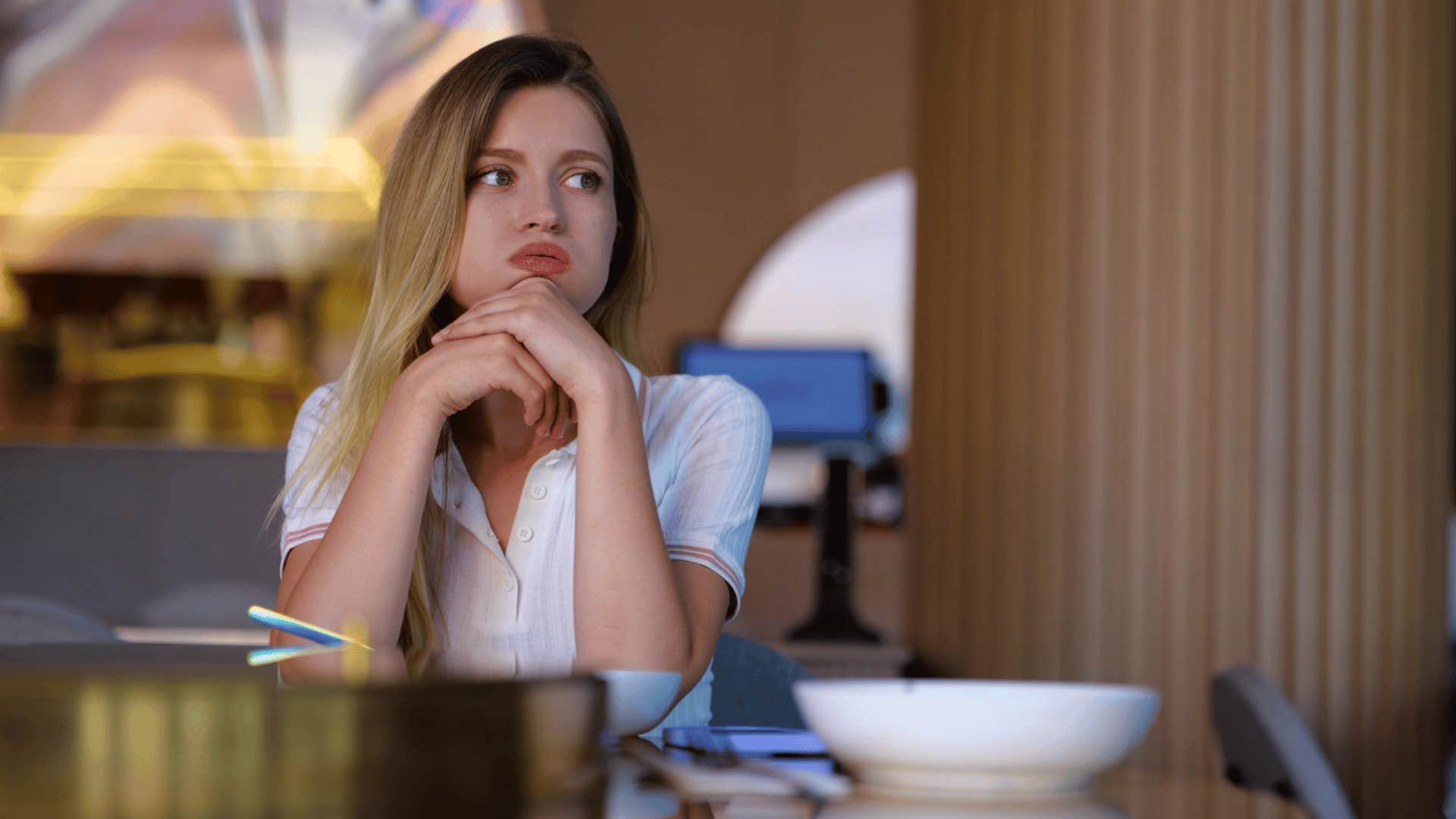 woman sitting alone at restaurant