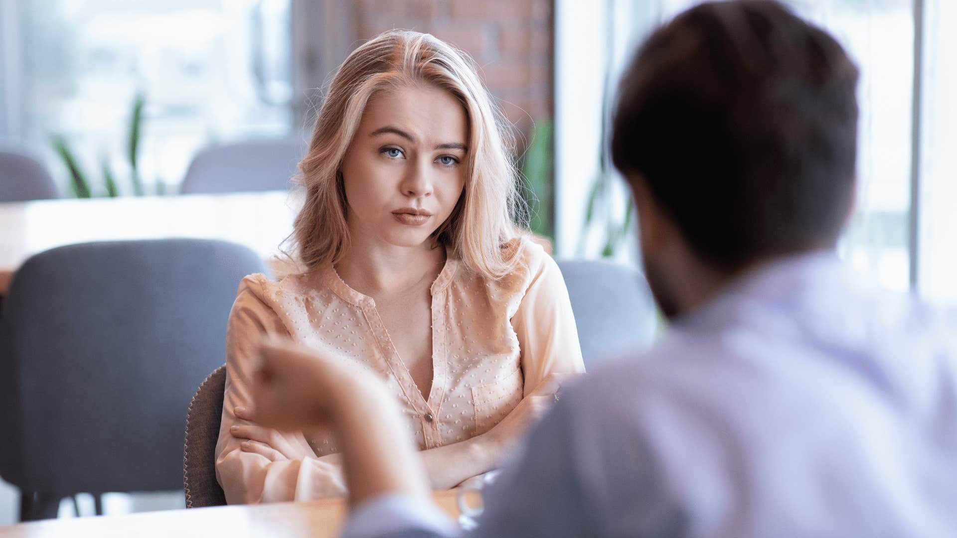 unimpressed woman on date