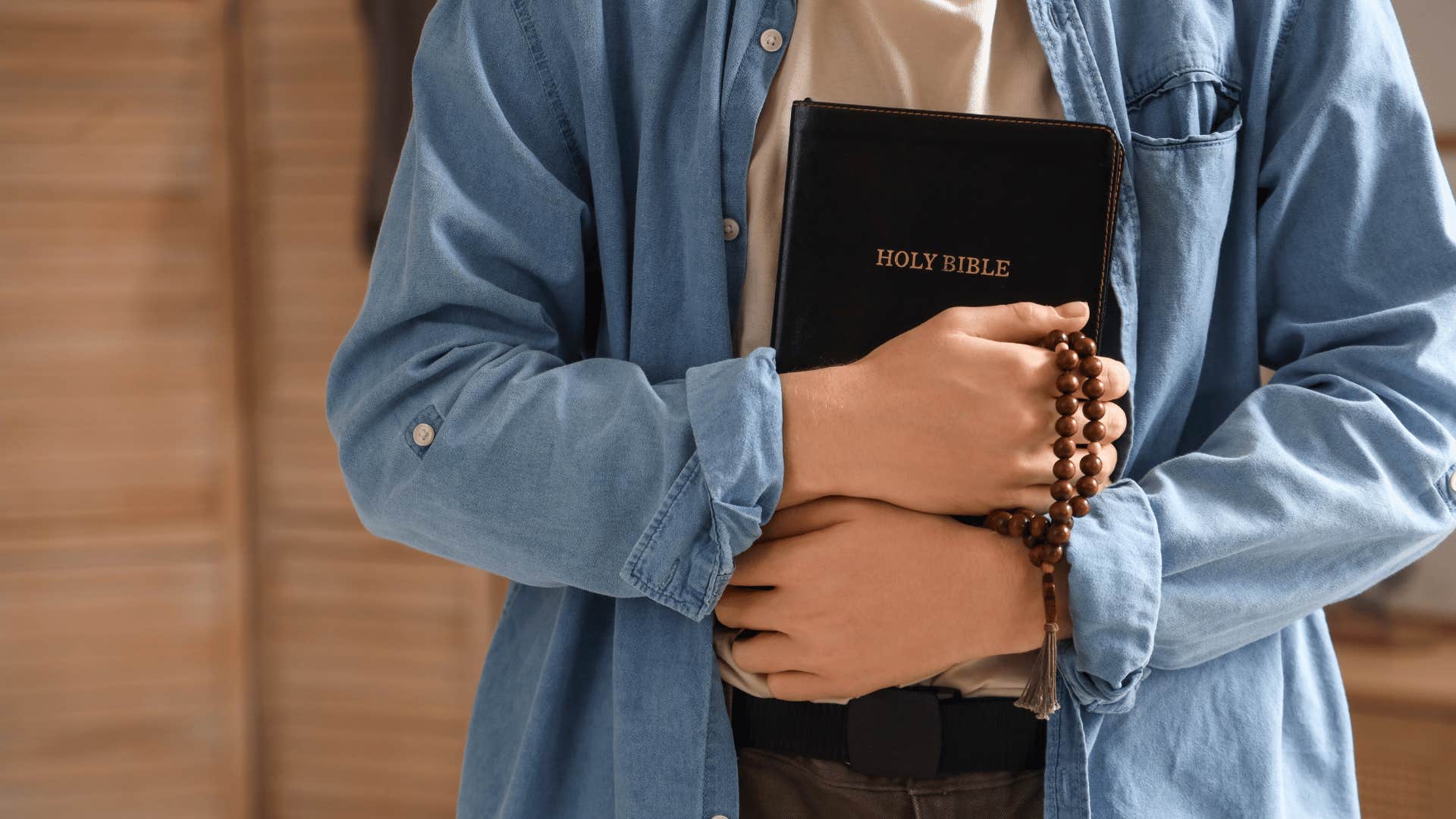 man holding bible