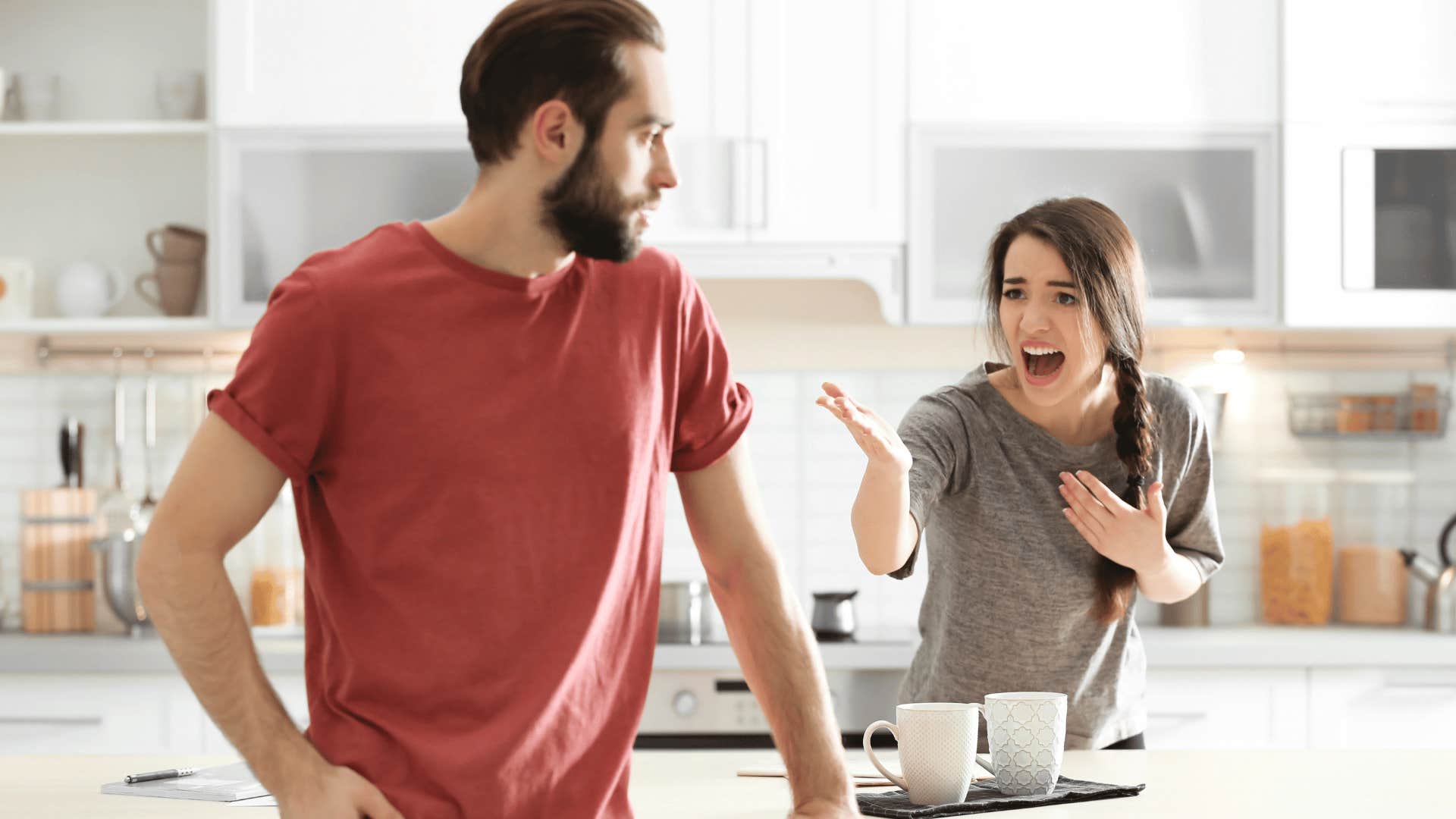 couple arguing in kitchen