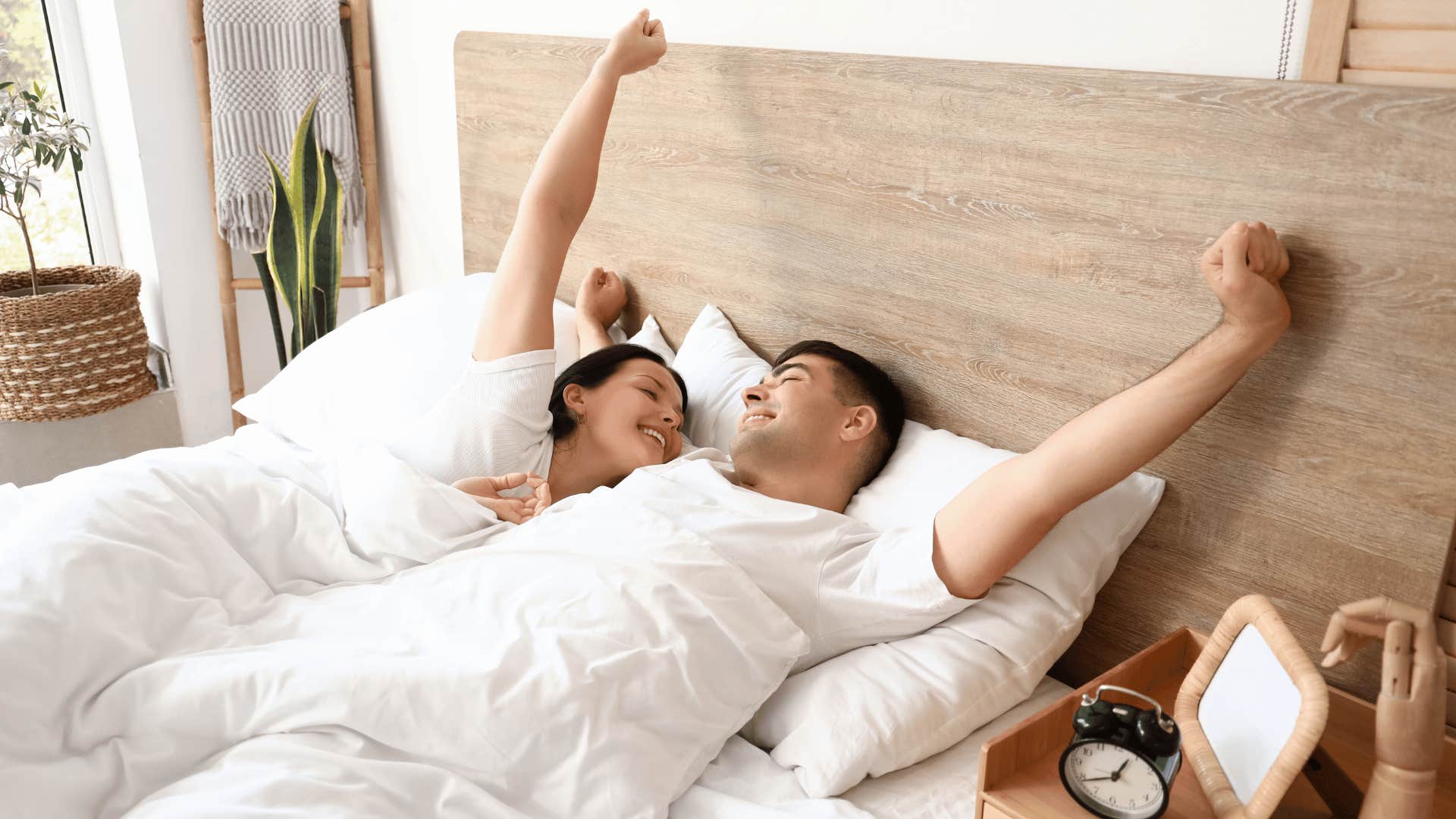 couple waking up in bed