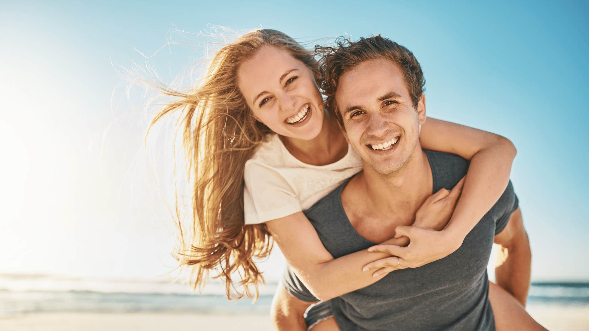 happy couple on the beach