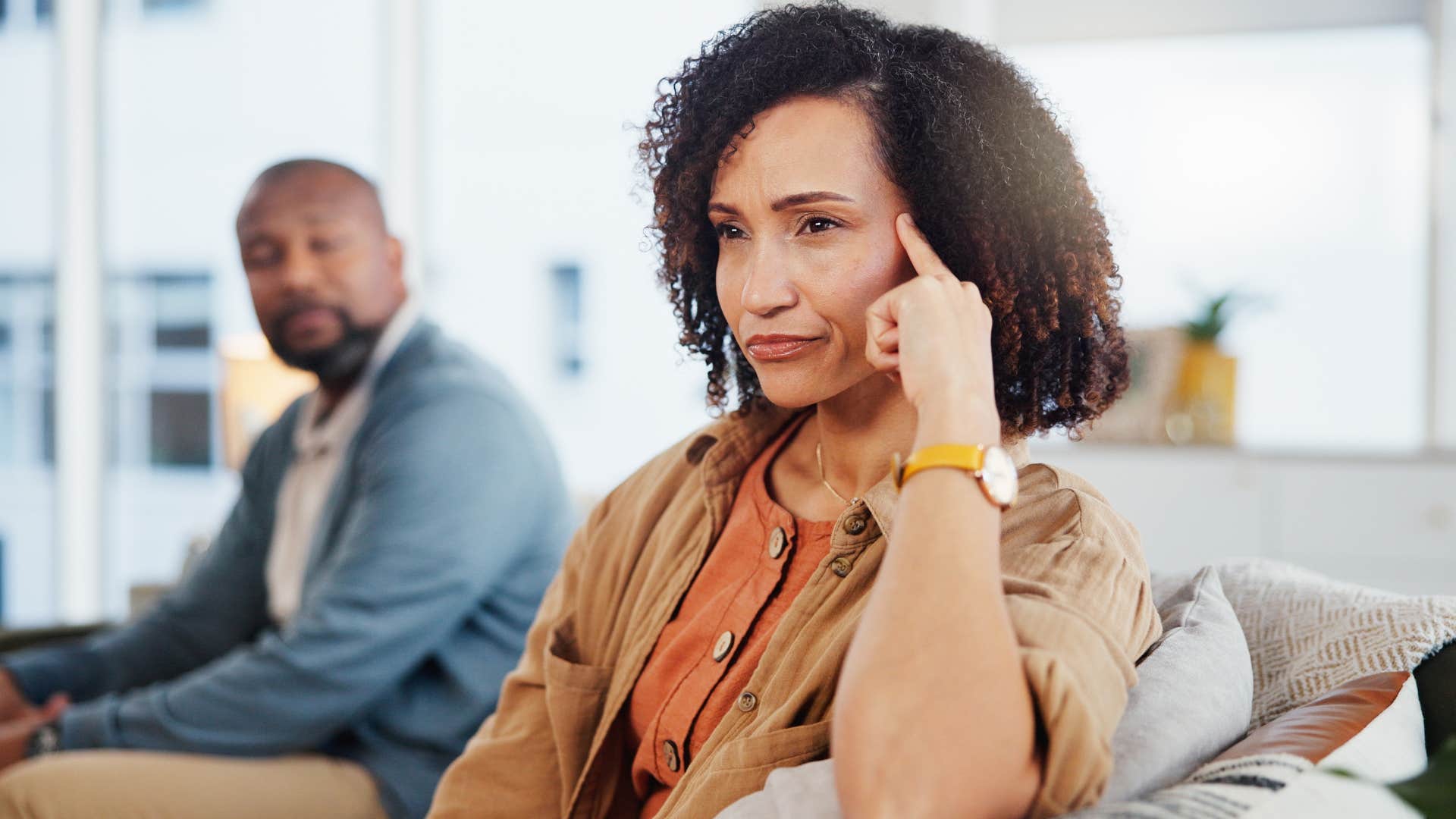 Annoyed woman looking away from her partner.