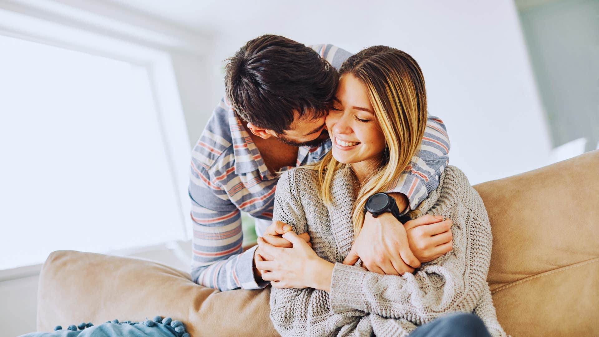 husband and wife hugging