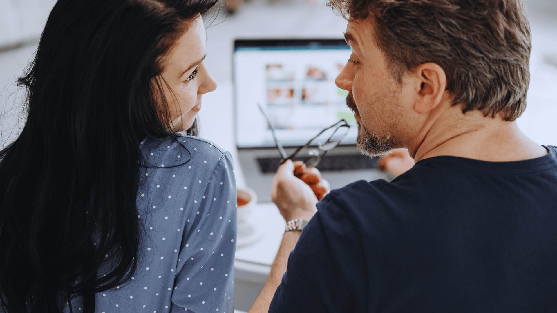 woman talking to man who practices self-care