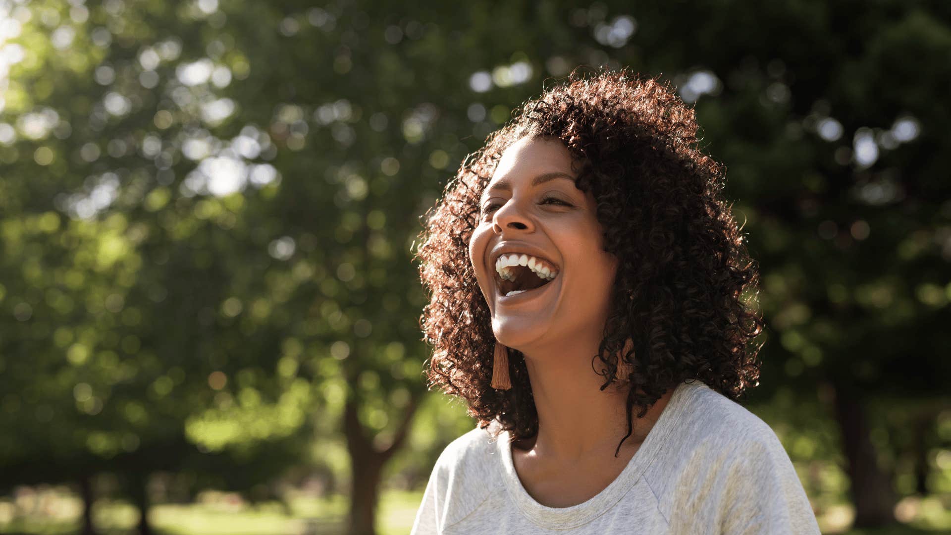 woman smiling outside