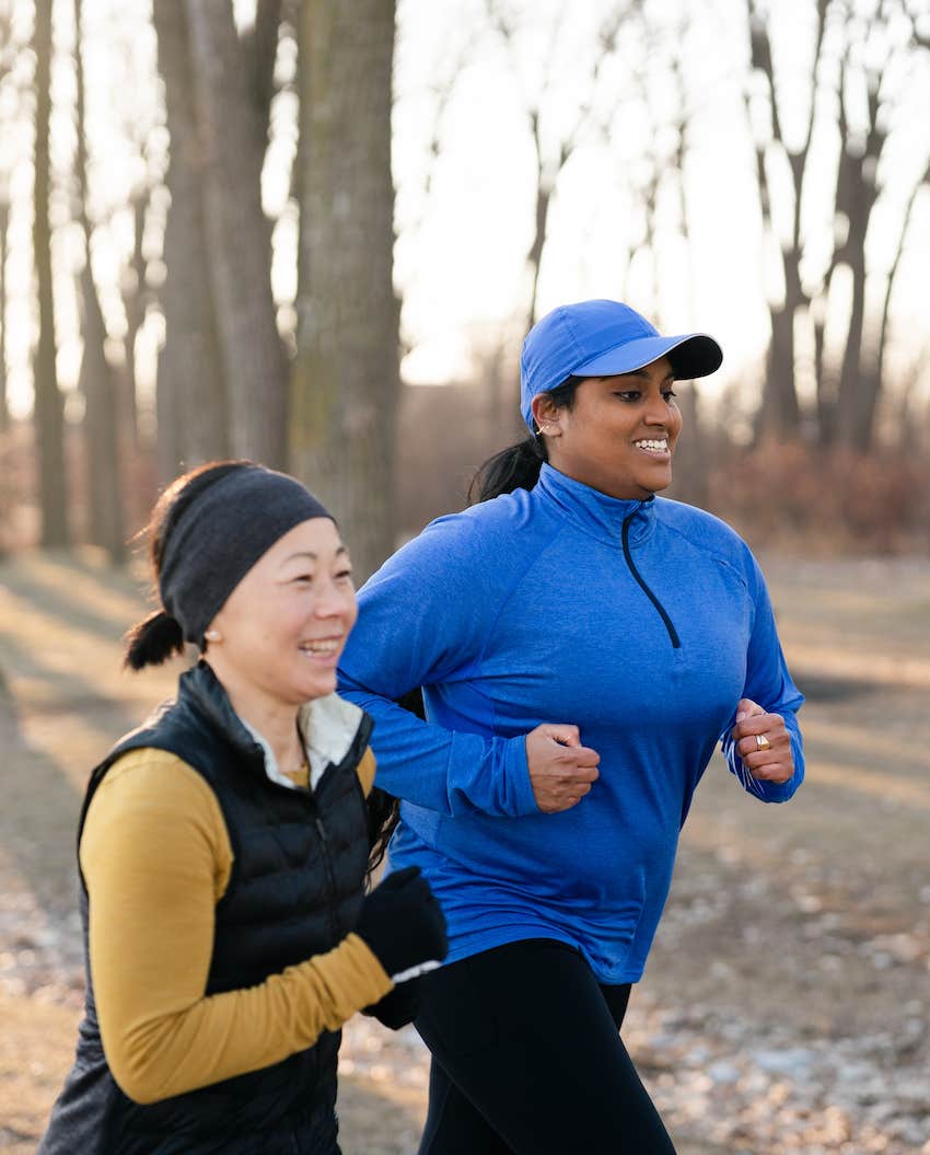 Two women running togehter