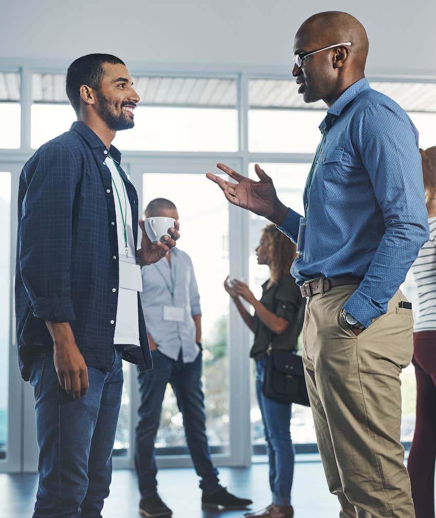 Two people talk while in the right group