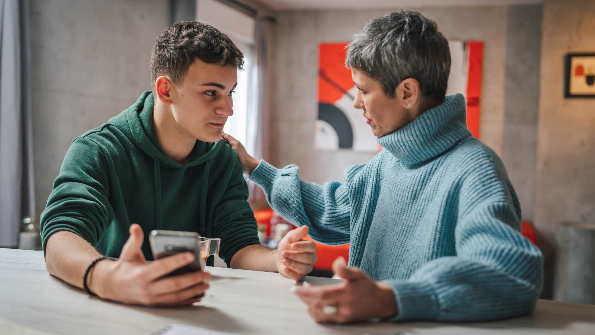 woman trying to explain herself to her teen son