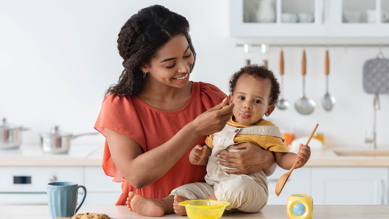 stay-at-home mom feeding baby