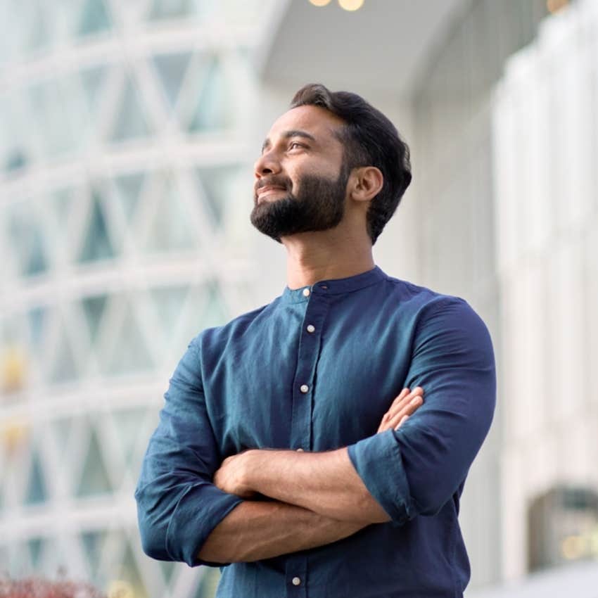 man looking up at sky