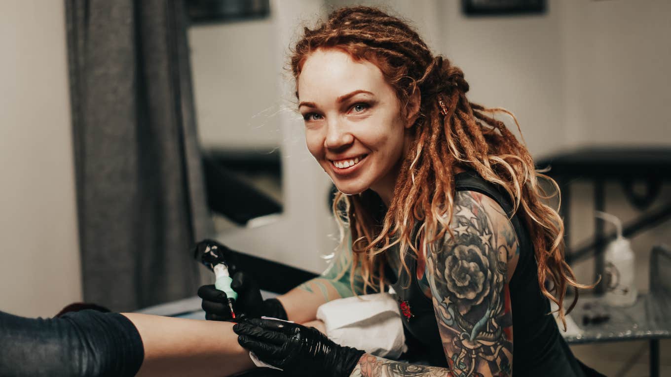 tattoo artist smiling