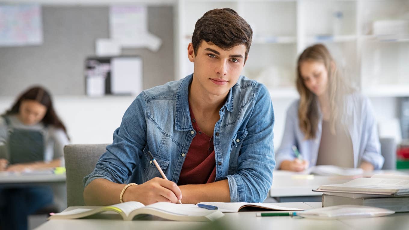 Teenage boy in class