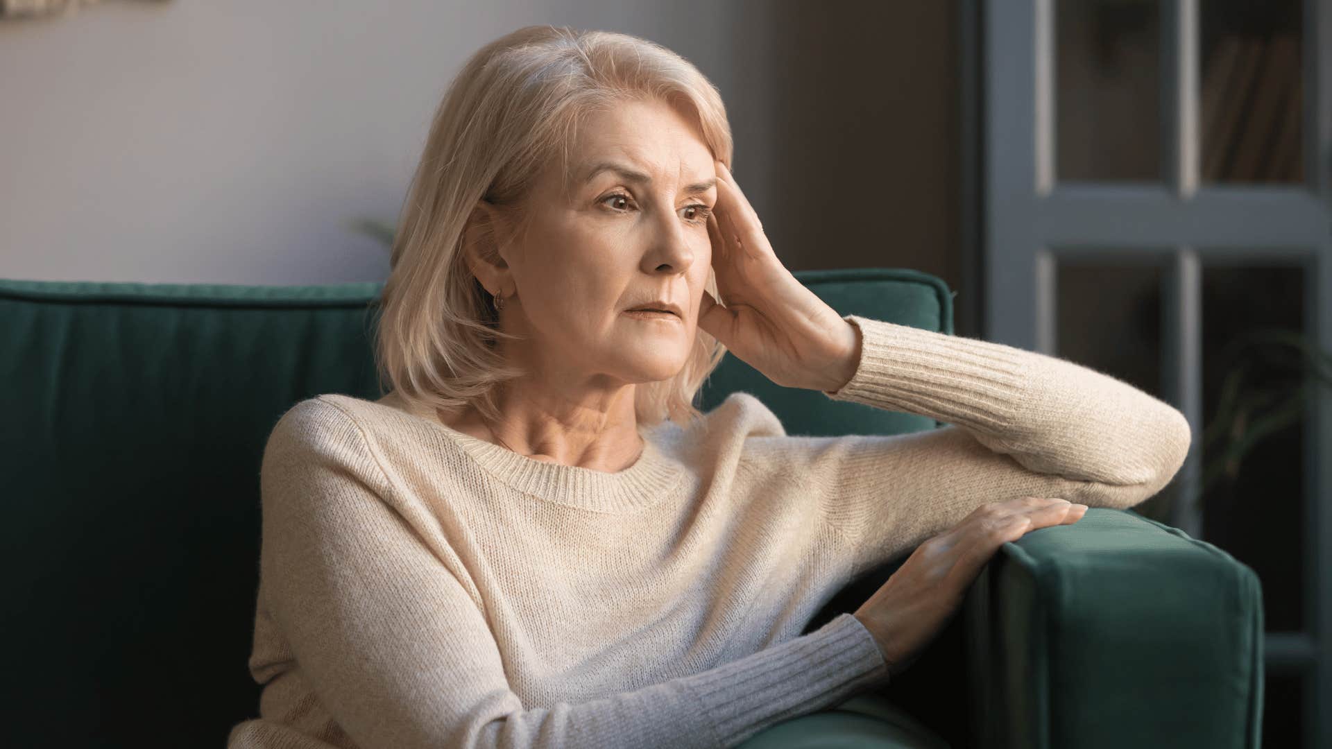 older woman sitting alone