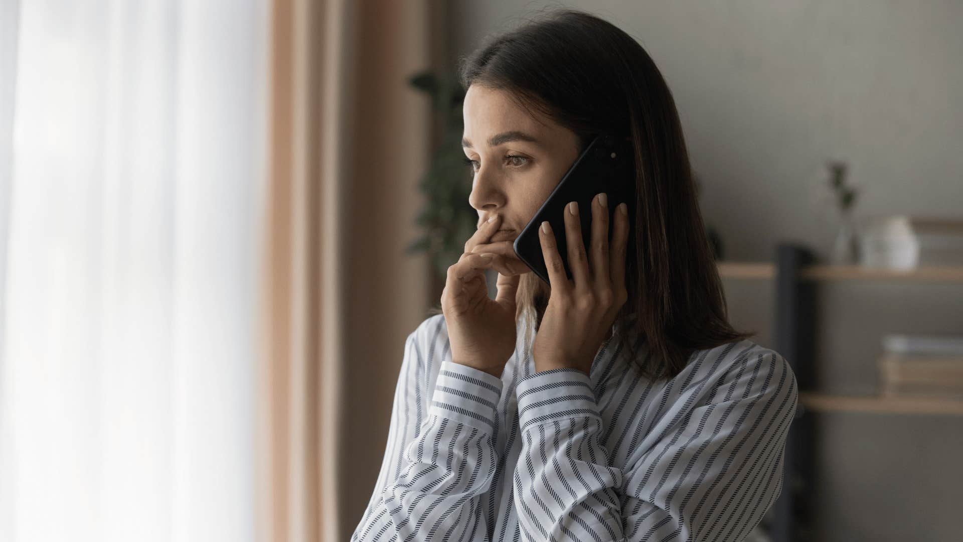 woman calling someone on the phone 