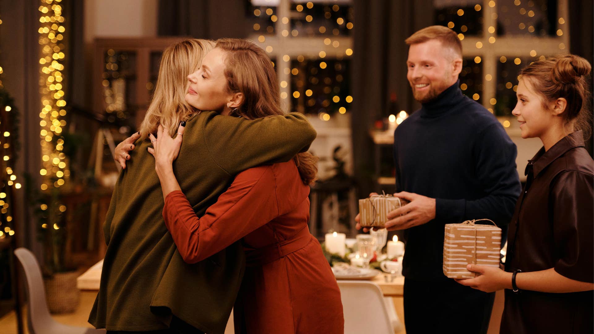 parent hugging adult daughter