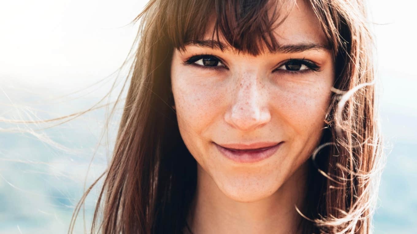 woman smiling into camera 