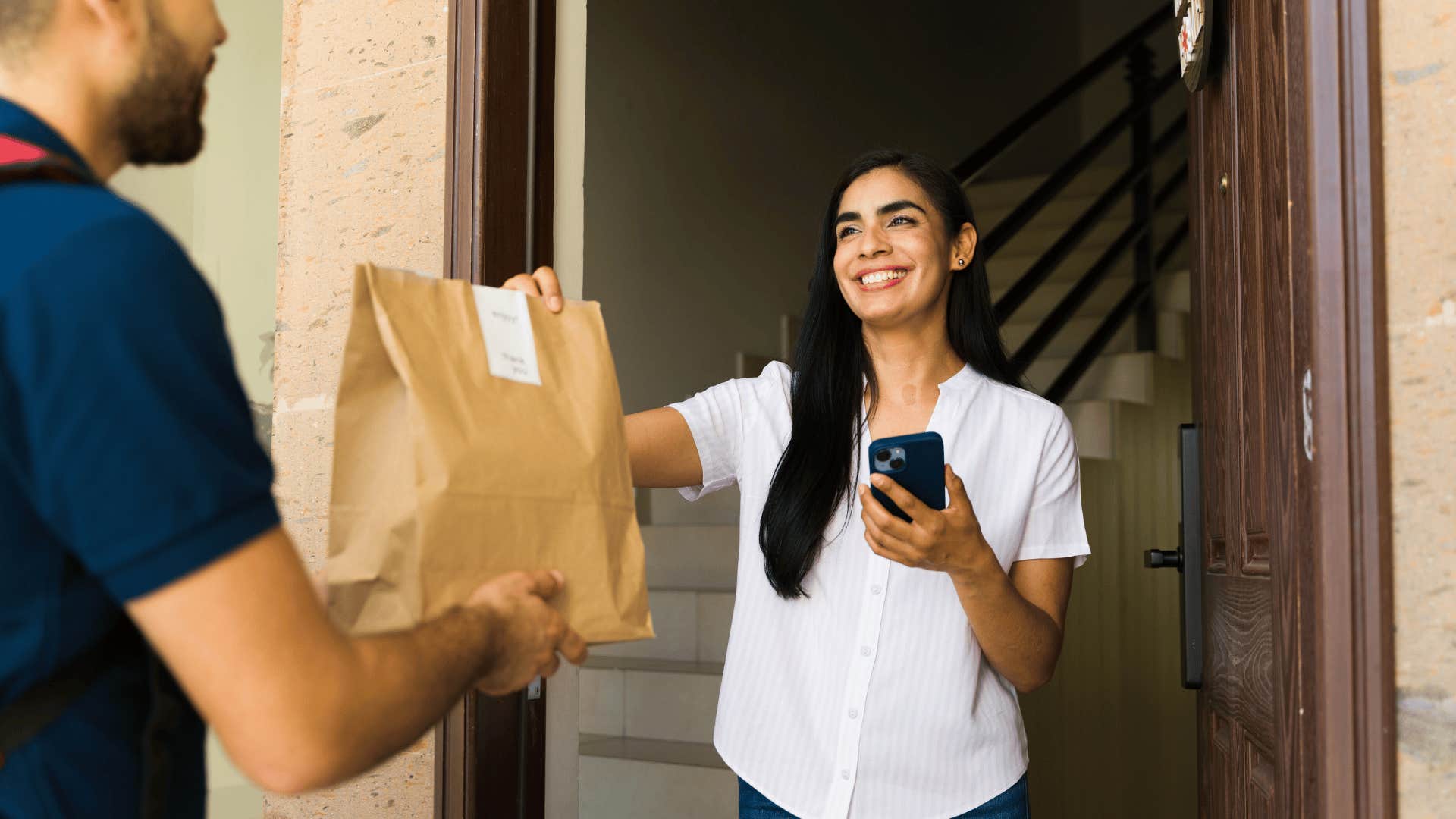 woman getting food delivered