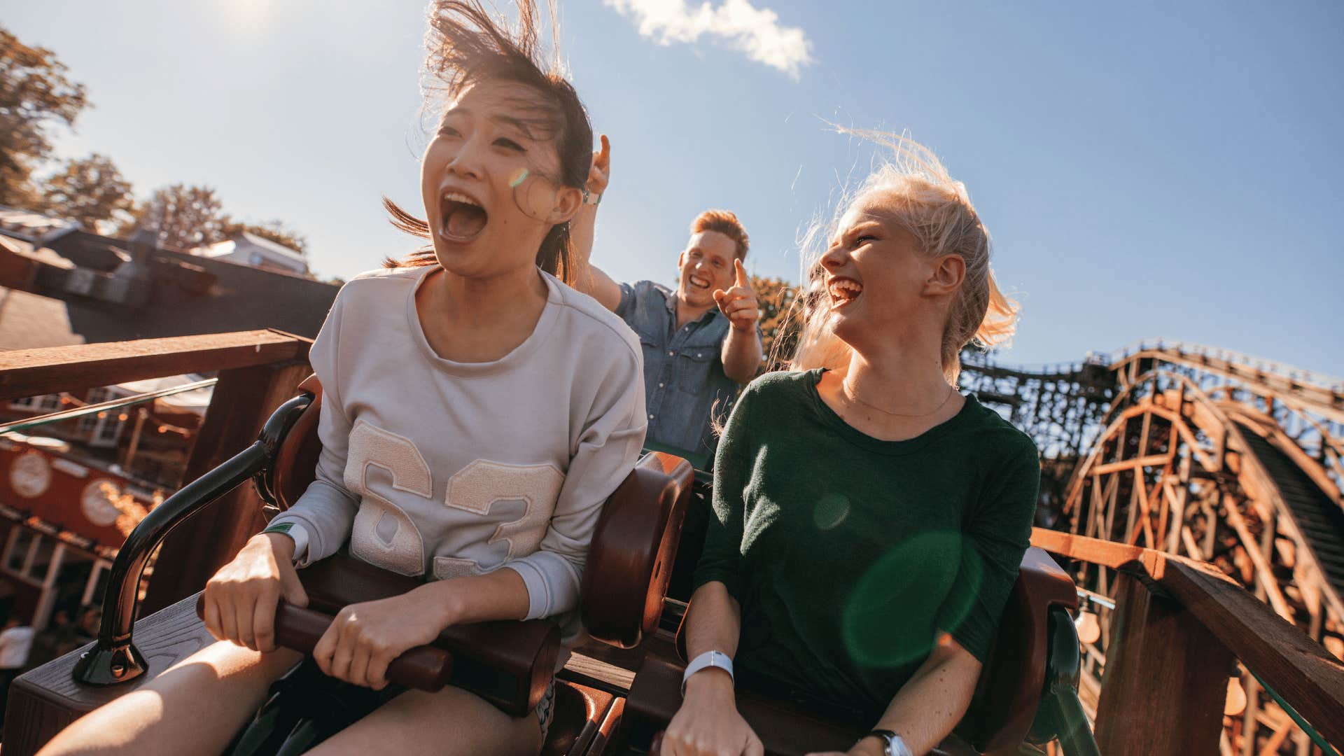 woman riding rollercoaster