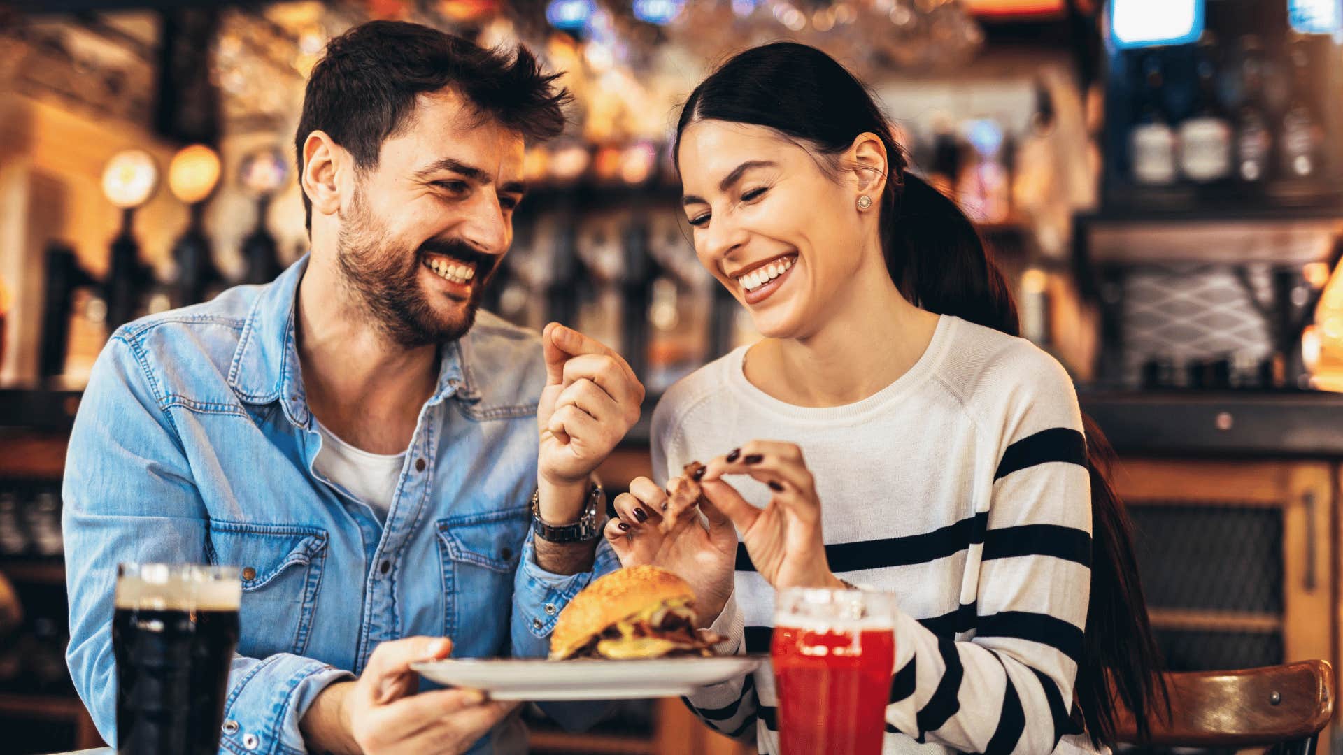 man and woman eating 