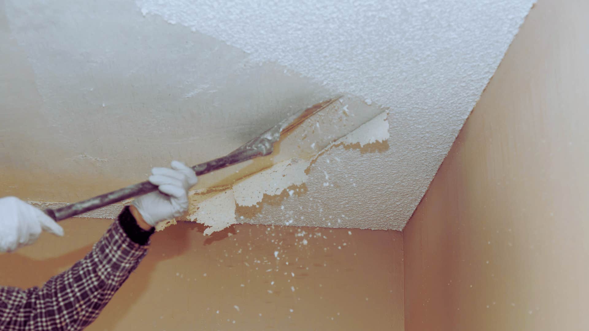 Gen Zers removing popcorn ceiling