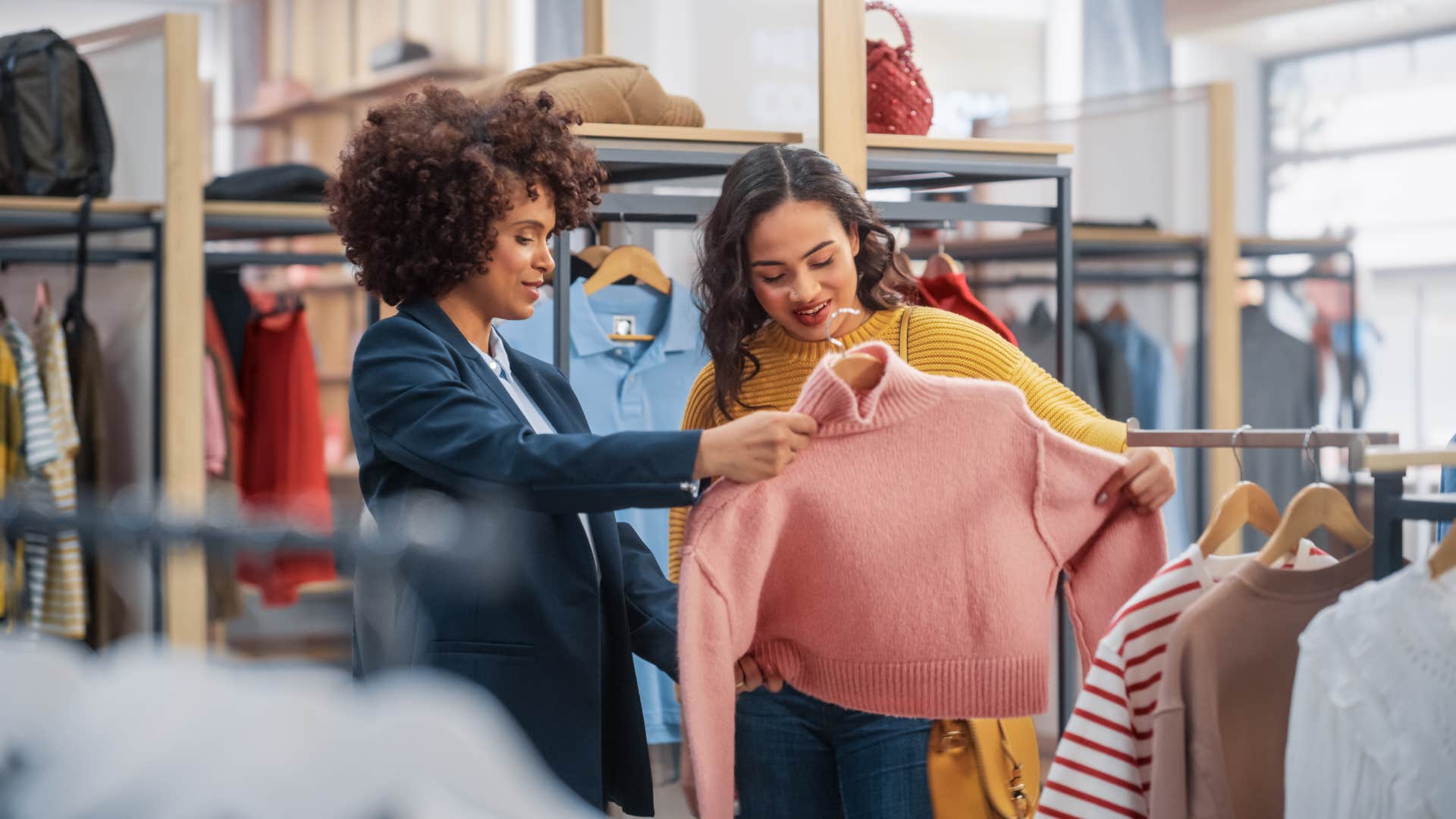 Young Female Customer Shopping in Clothing Store