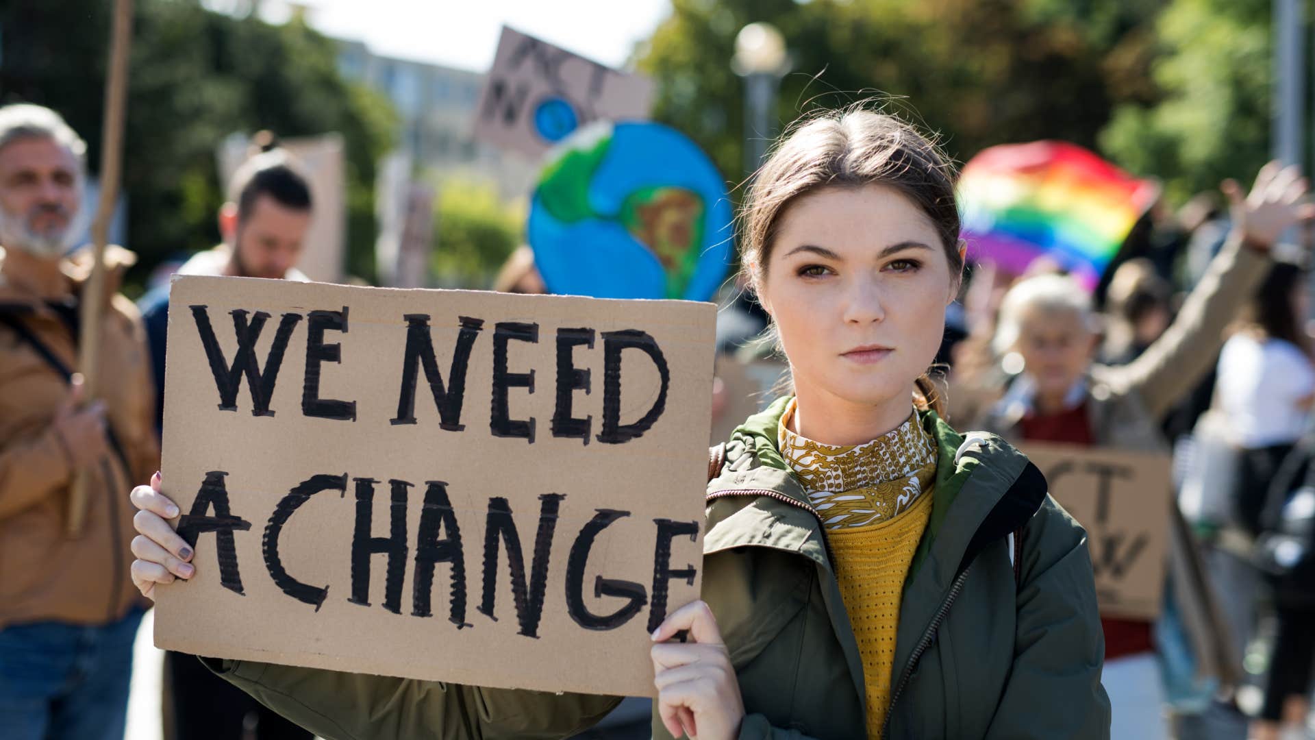 gen z woman at climate change protest