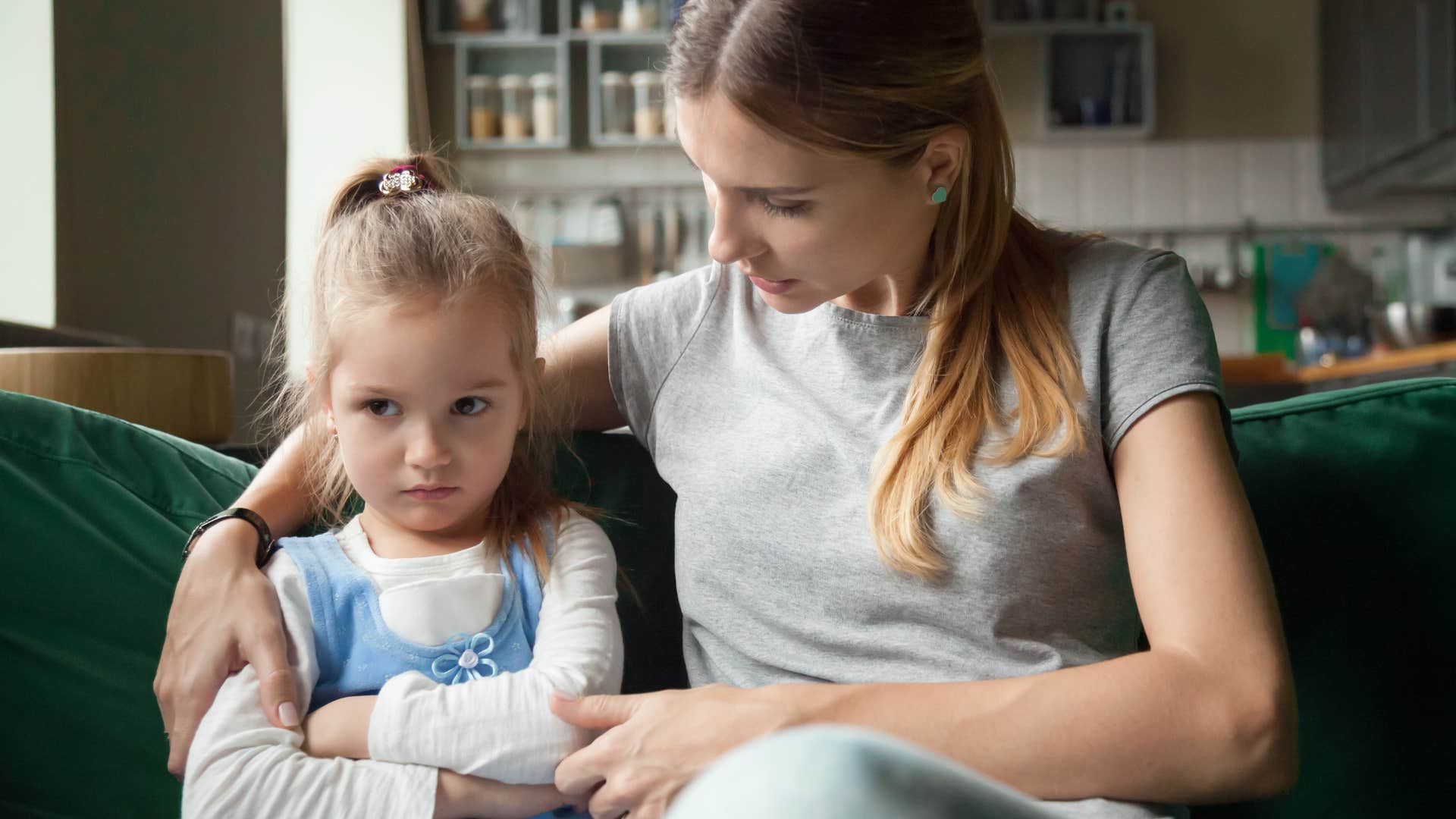 Woman talking to her daughter.