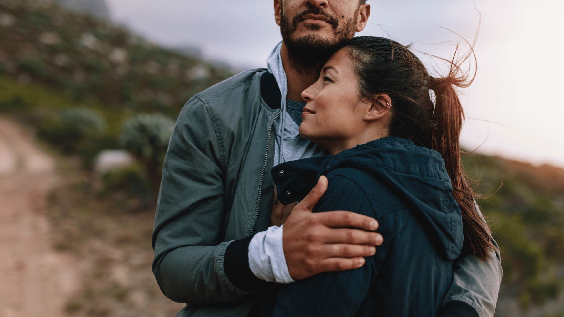 good man holding the woman he loves