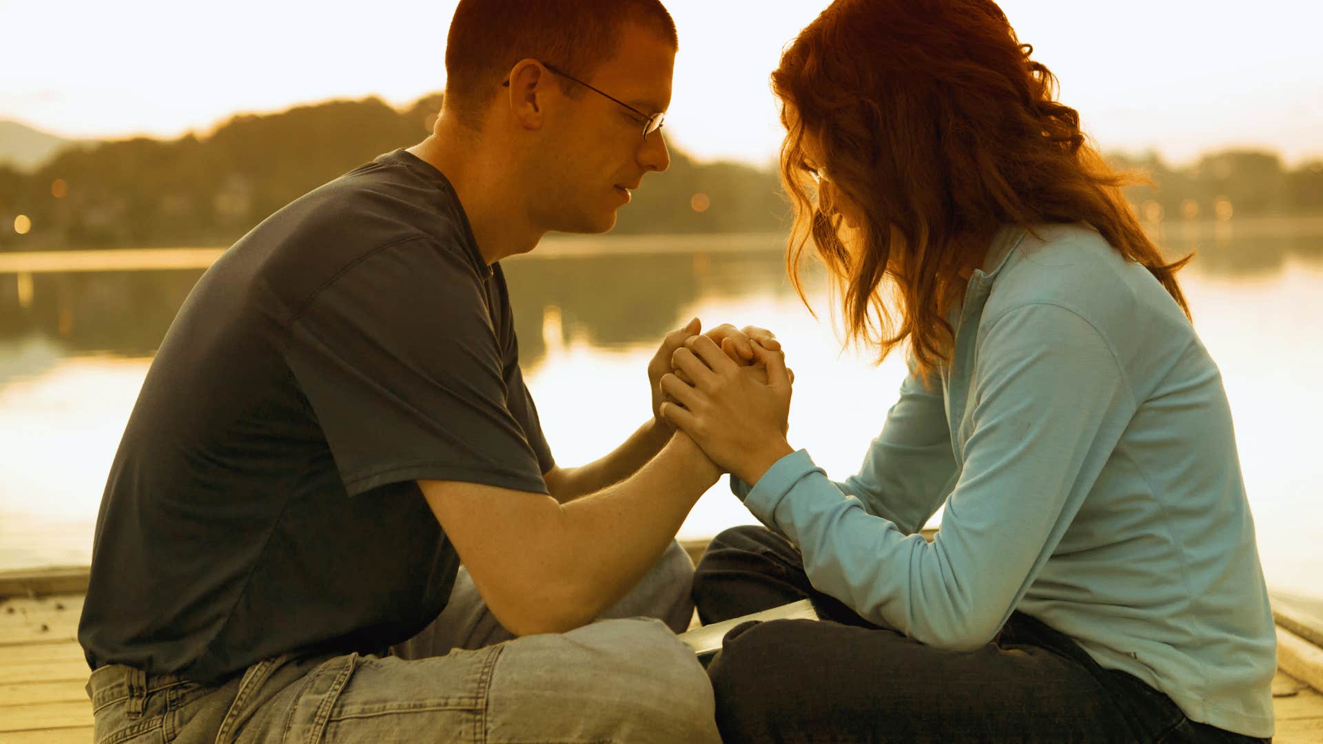 husband and wife meditating together