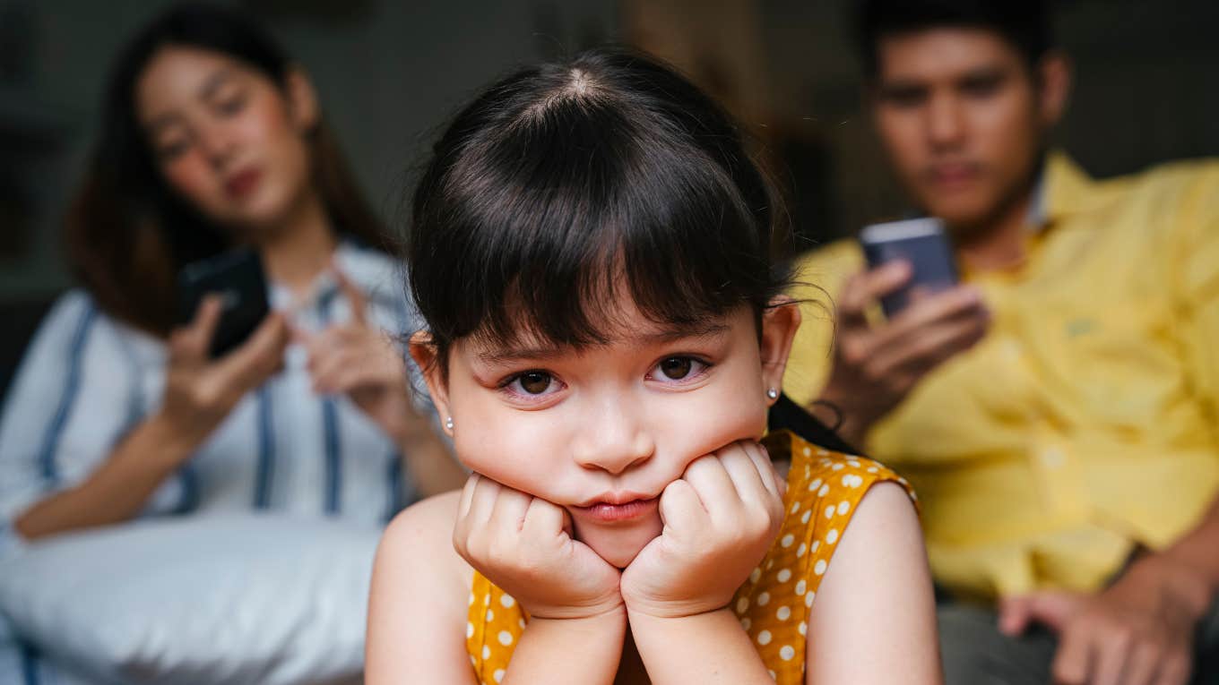 parents ignoring child who wants attention