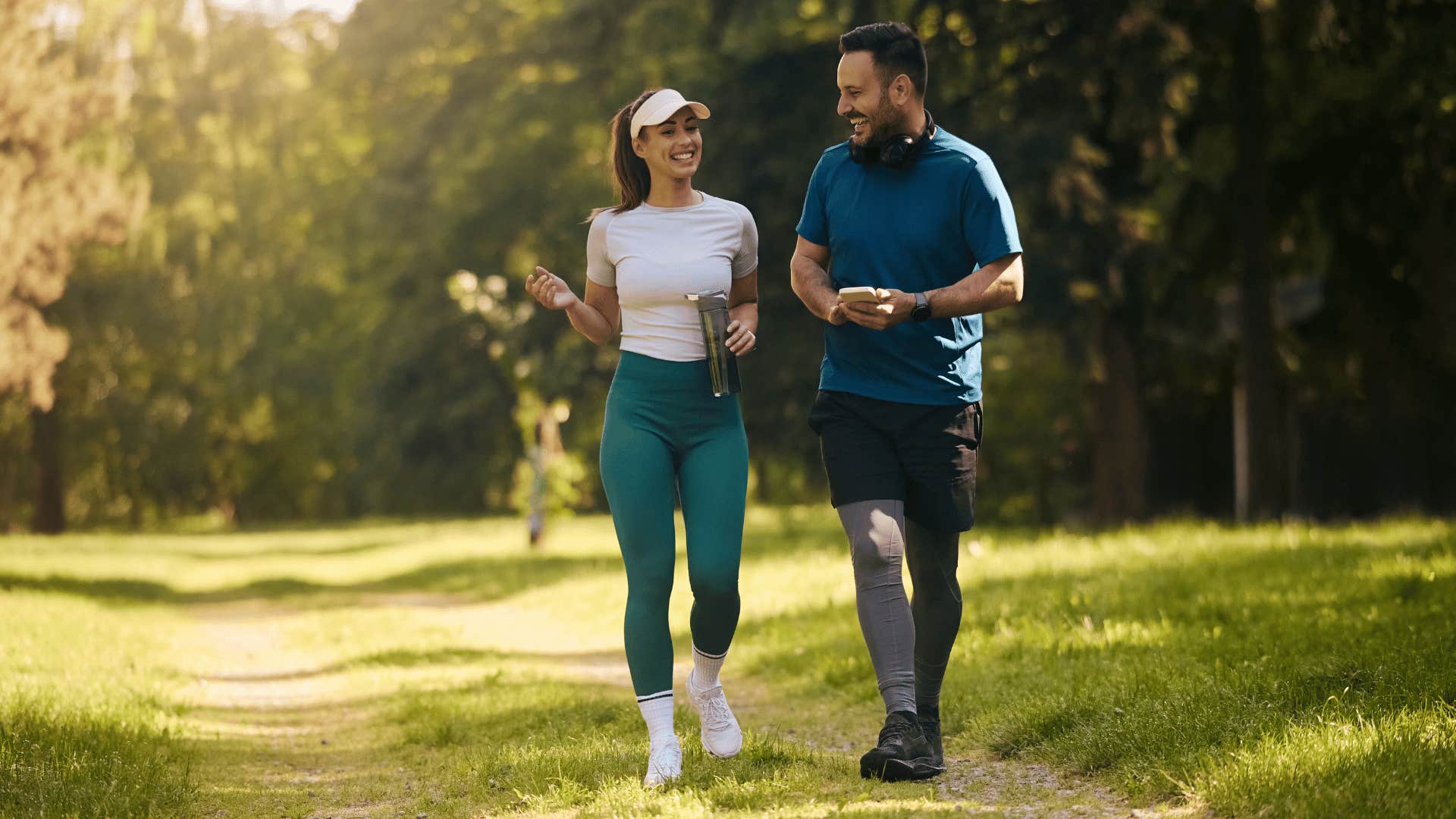 Man and woman running in a park for the thrill