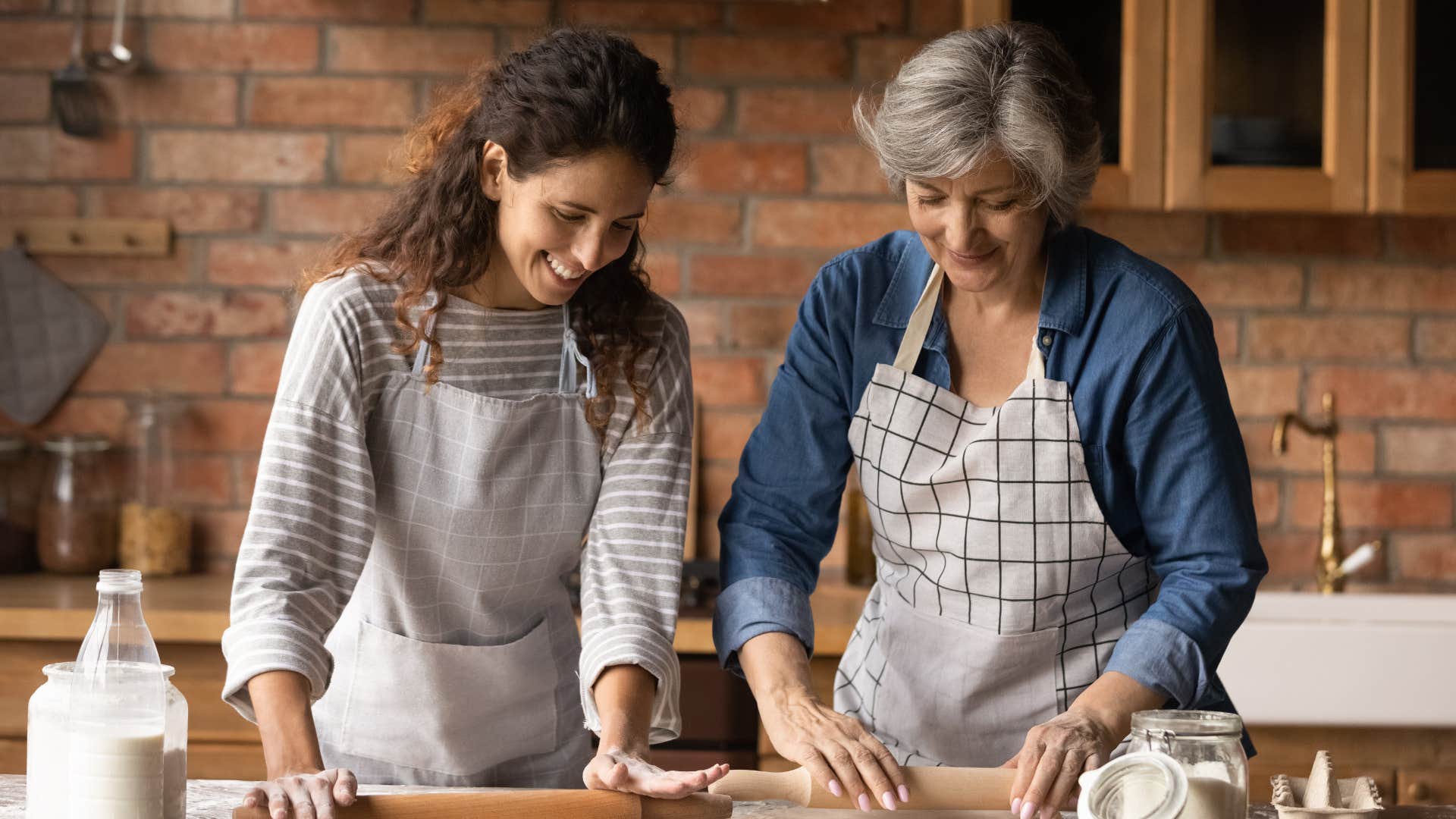 adult woman cooking a meal with her mother