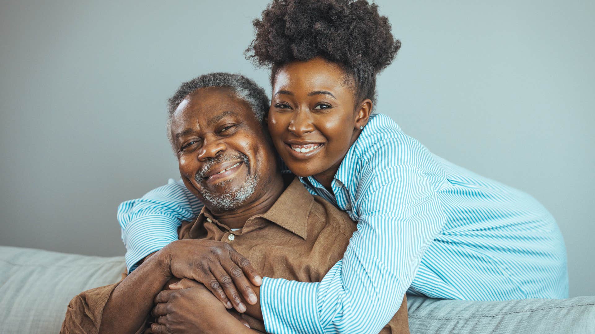 woman hugging her older dad