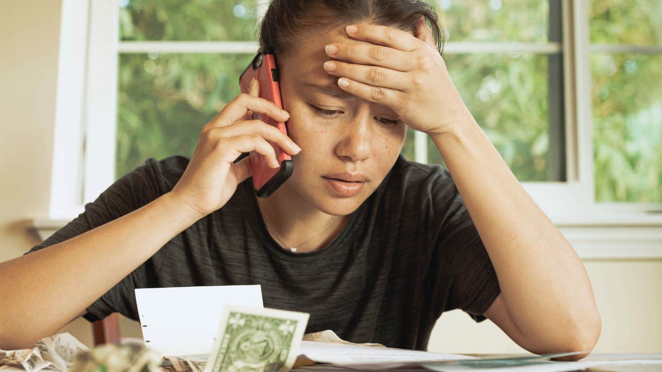 woman stressed about being broke having no money