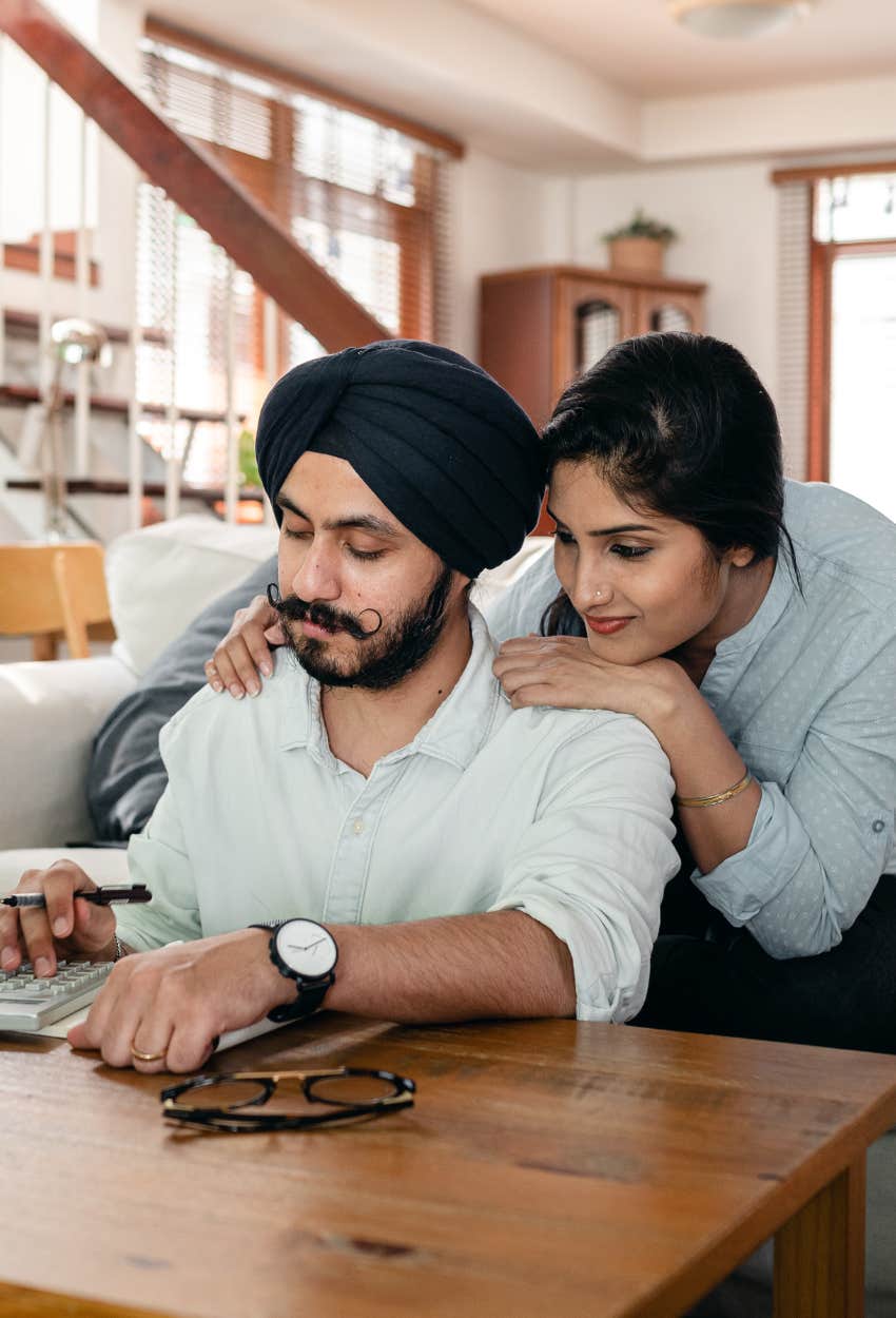 wife supporting husband during a difficult time