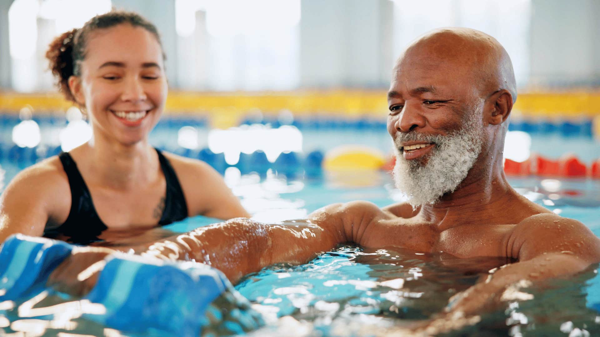 man doing aqua fit class