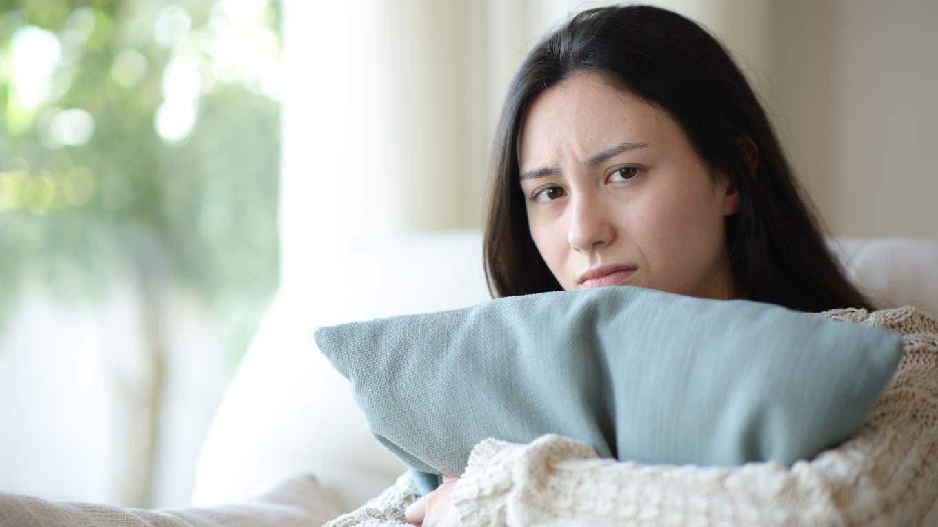 Woman whose stagnant emotions are weighing her down