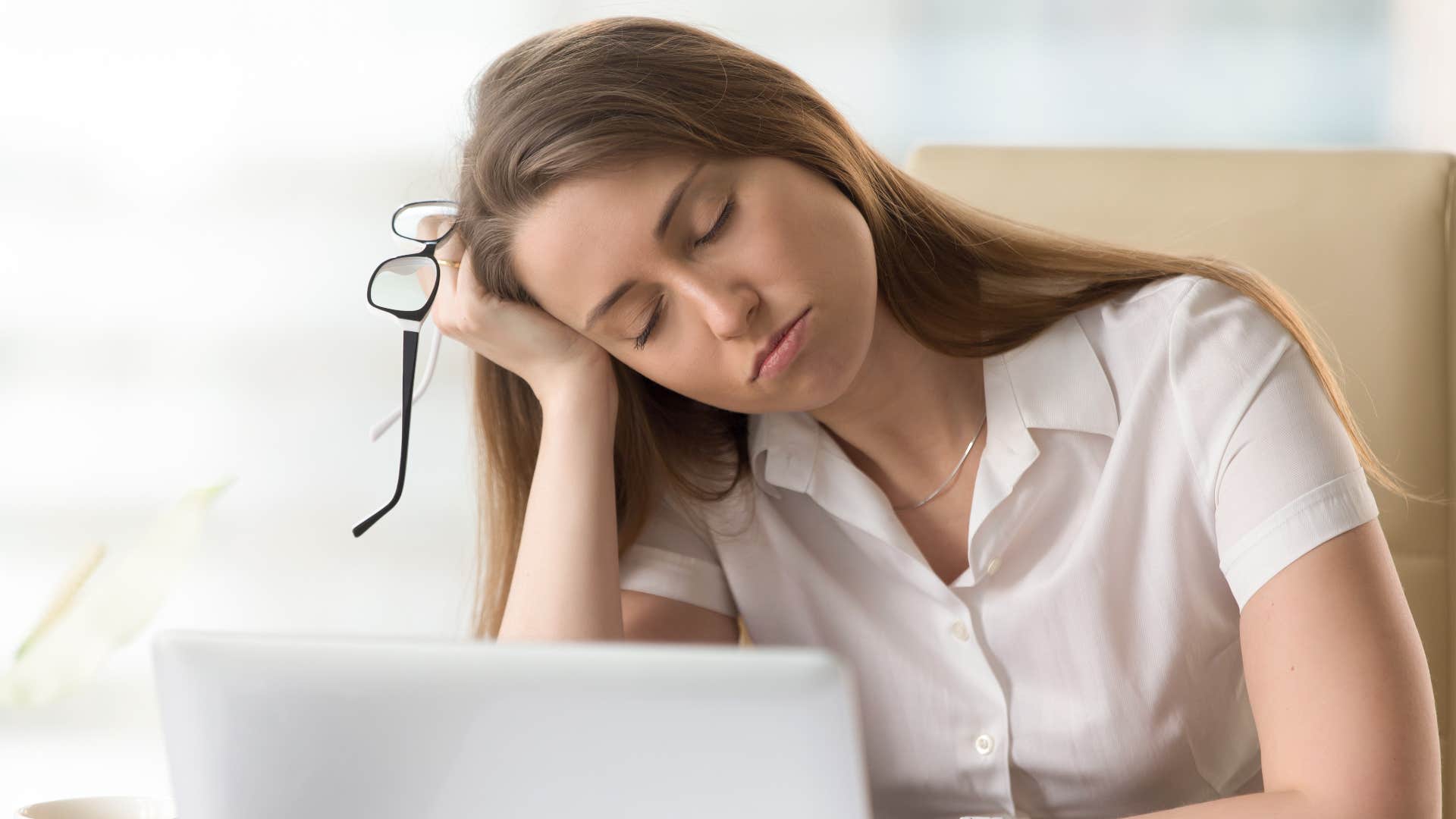 Gen Z employee napping on the clock