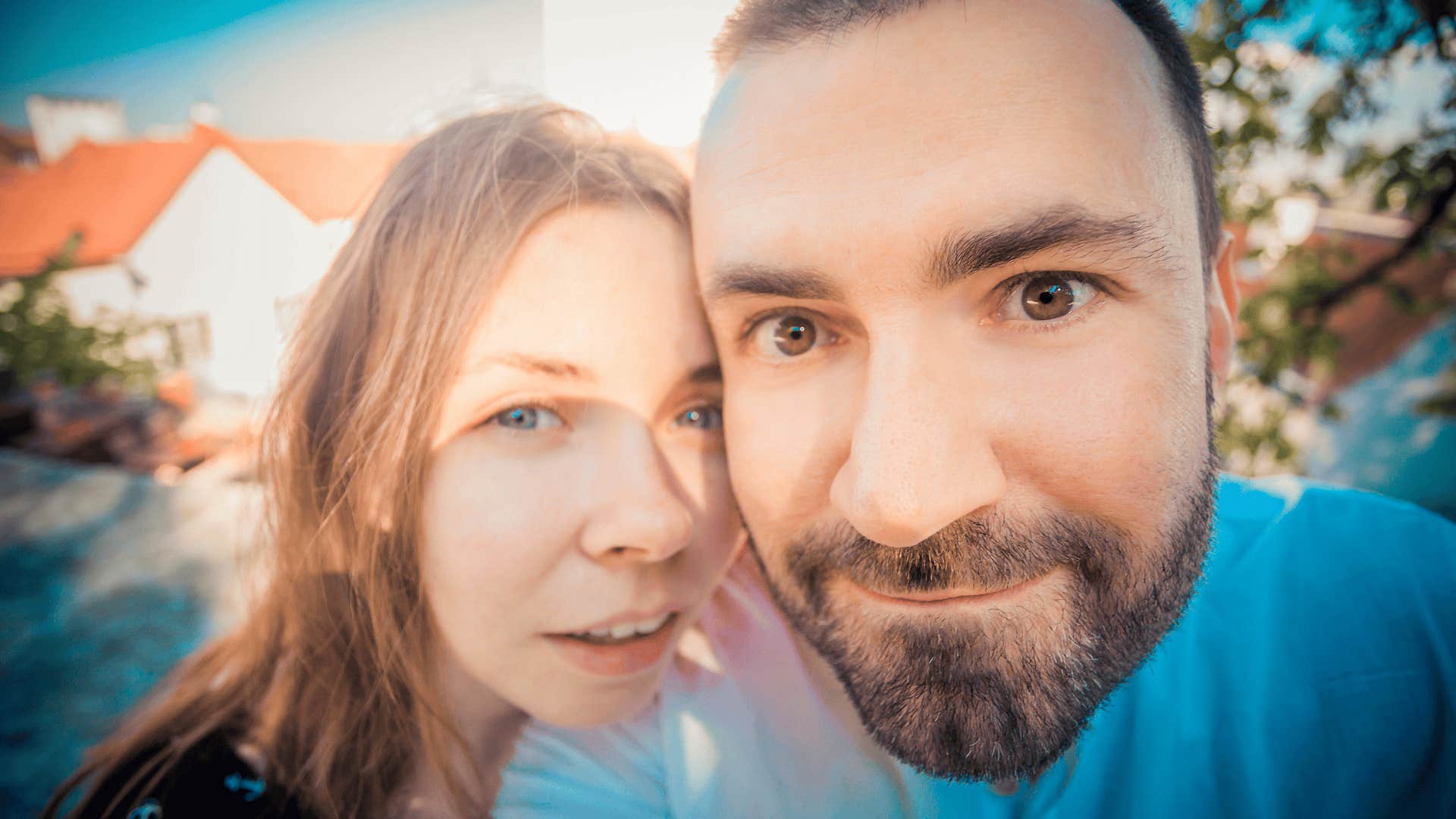 young couple making selfie on a wide angle lens