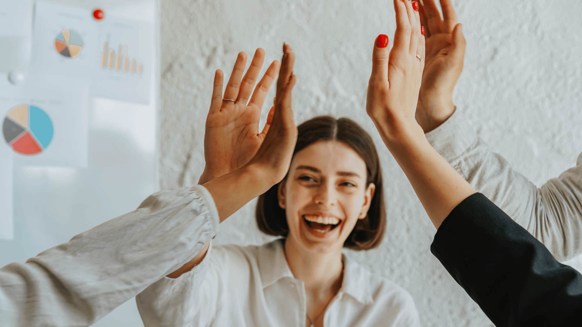 woman being congratulated for understanding the assignment